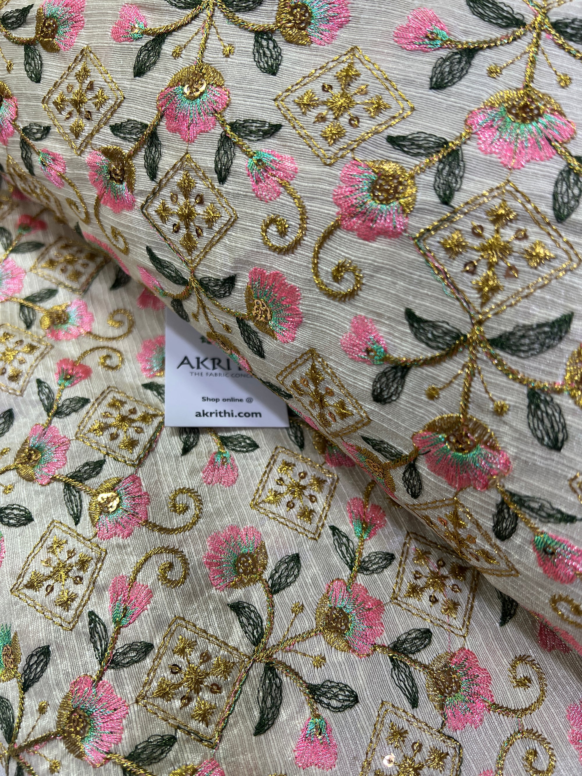 Embroidery on raw silk fabric