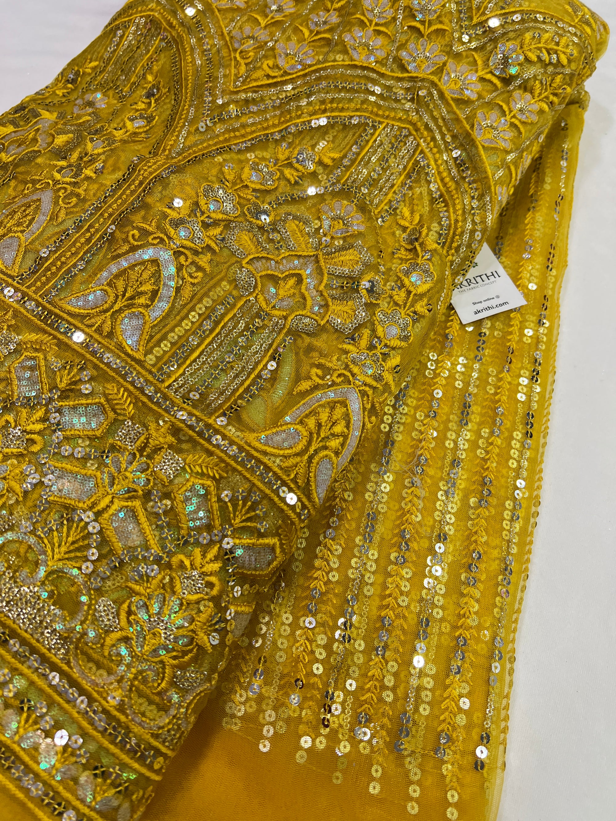 Embroidery on net fabric