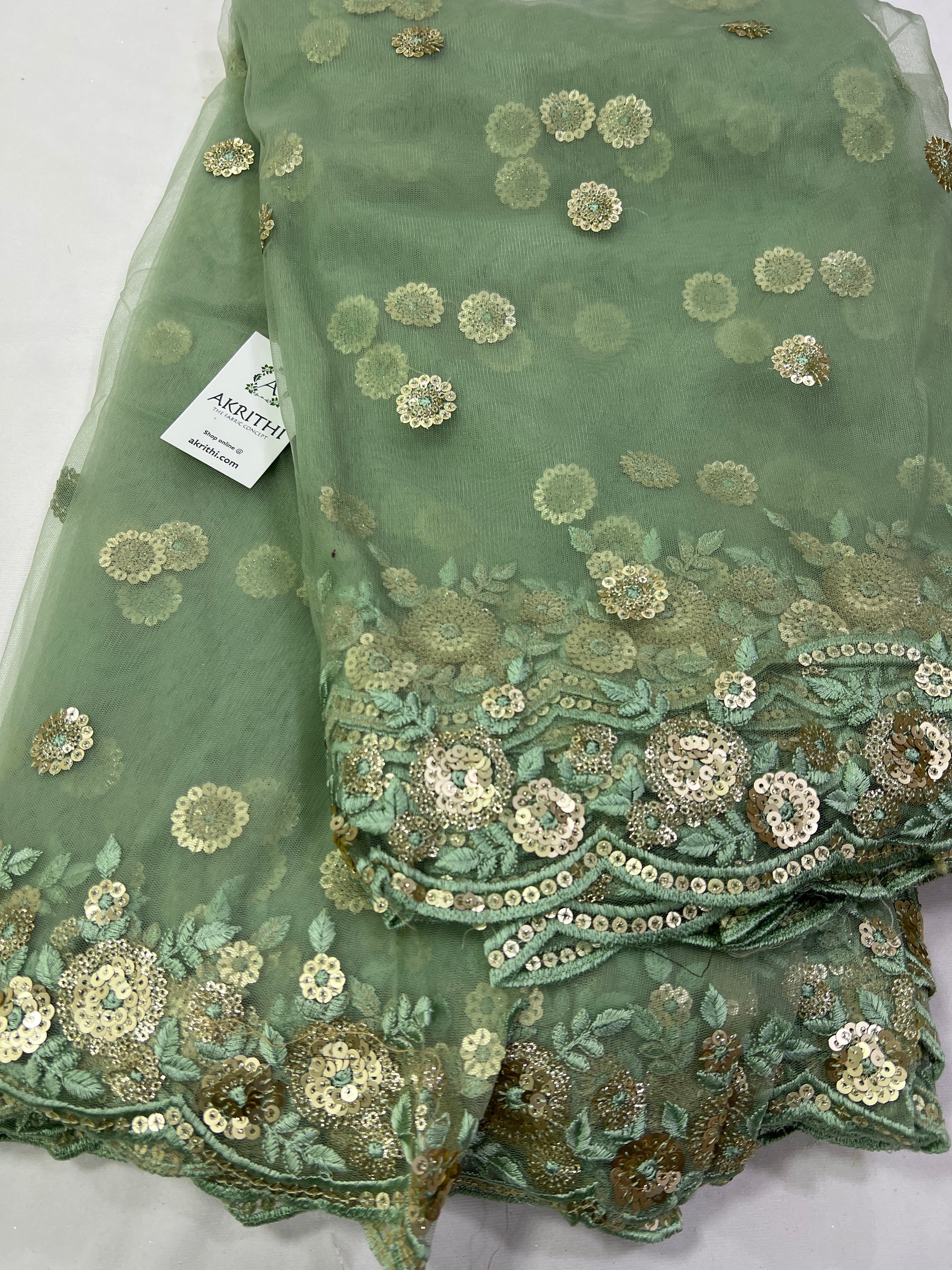 Embroidery on net fabric