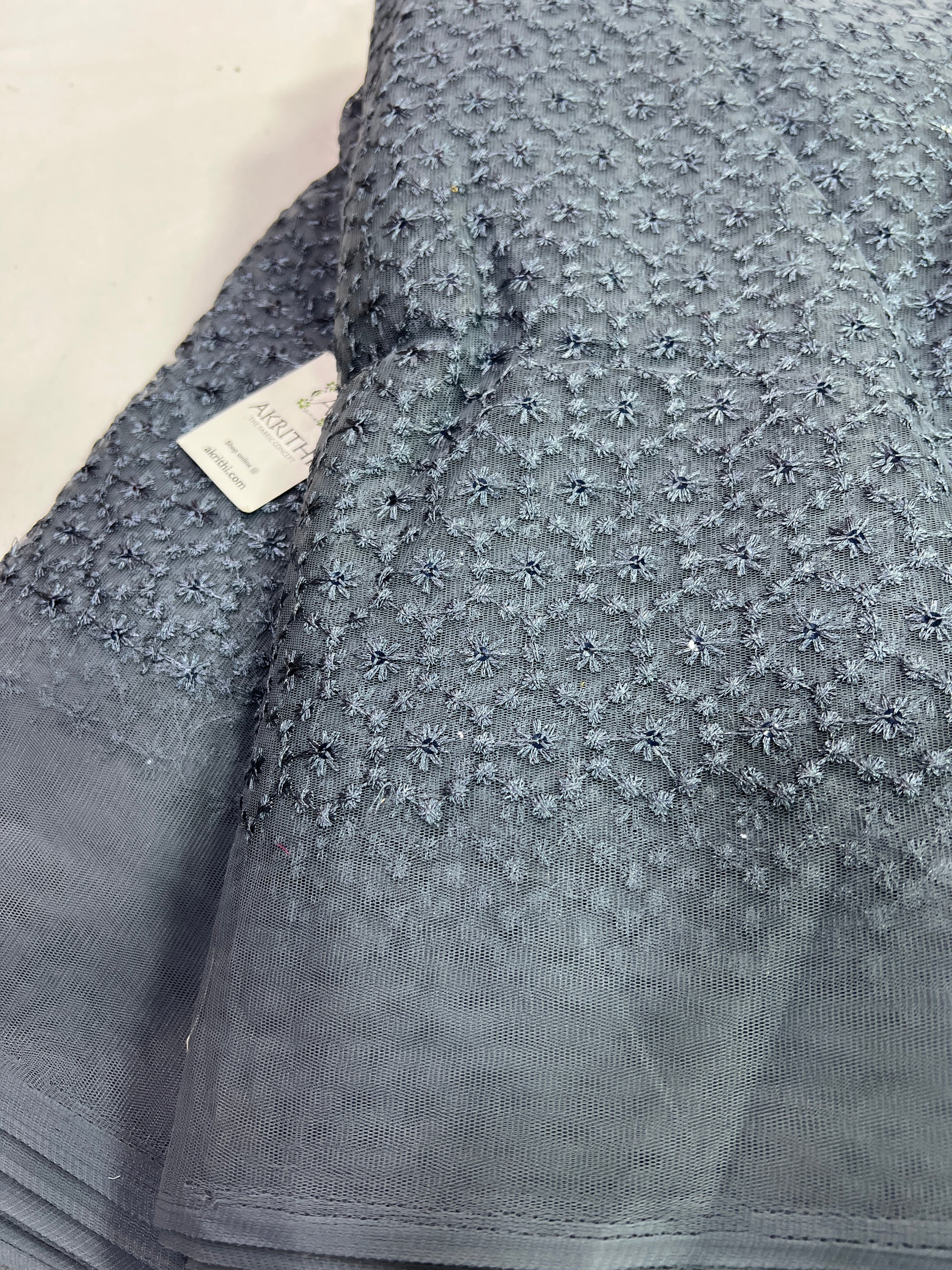 Embroidery on net fabric