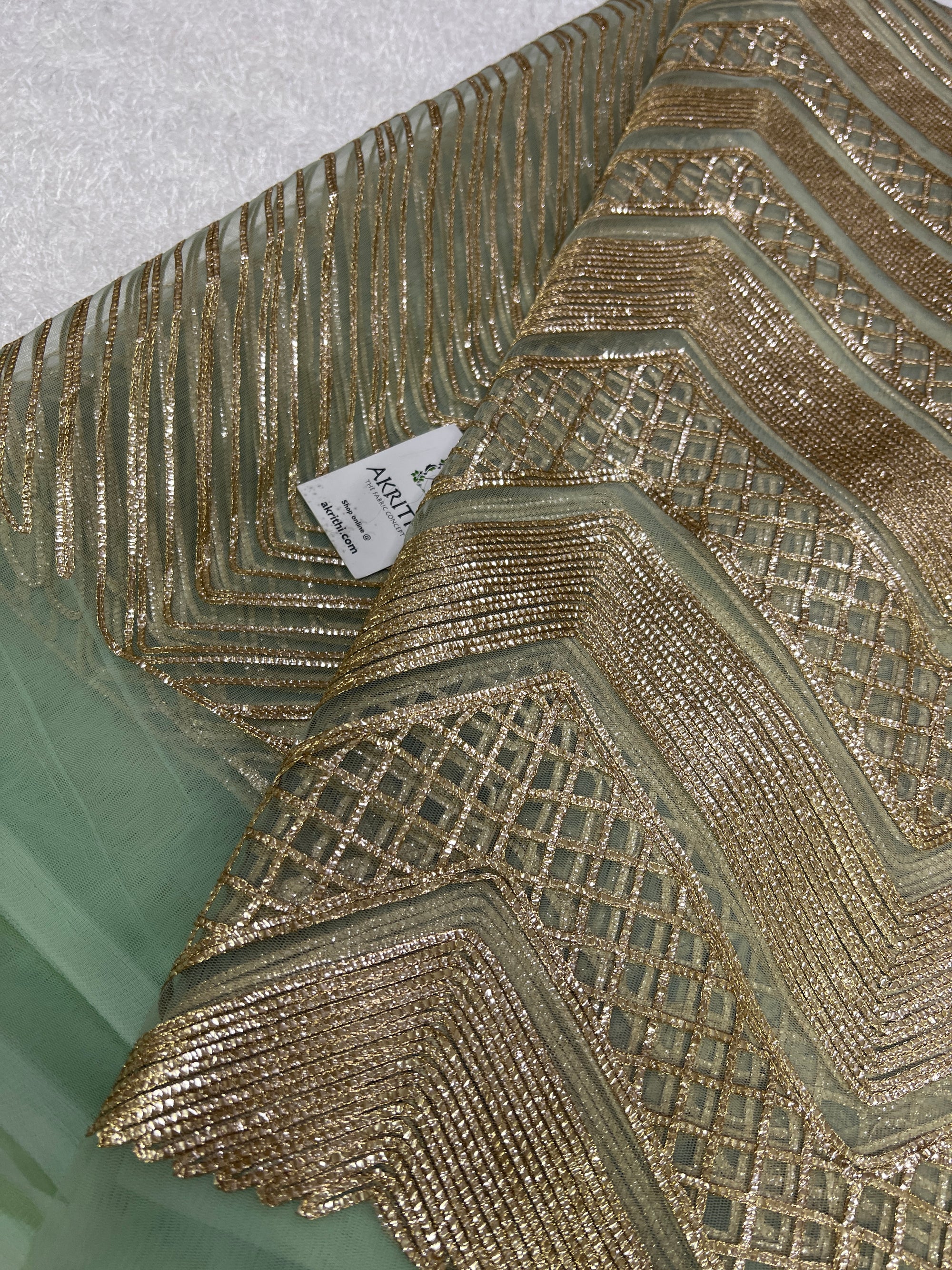 Embroidery on net fabric
