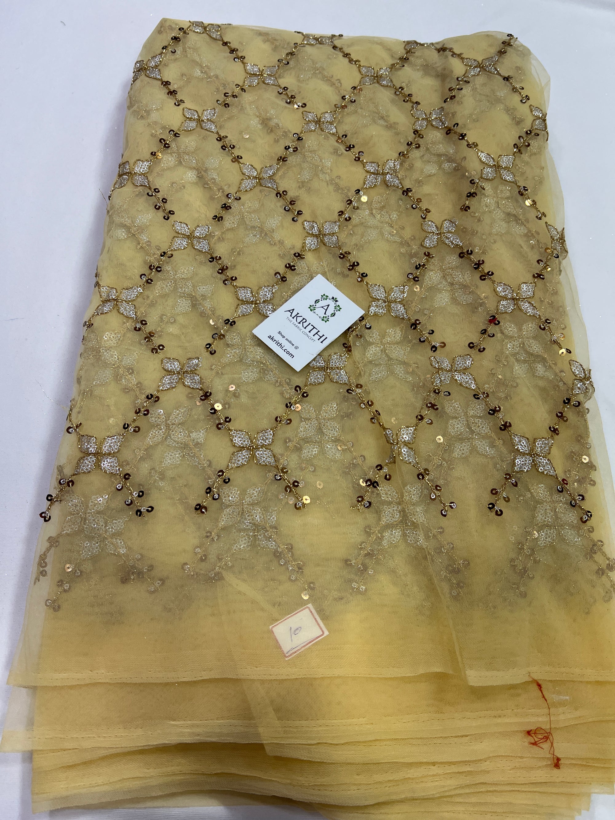 Embroidery on net fabric