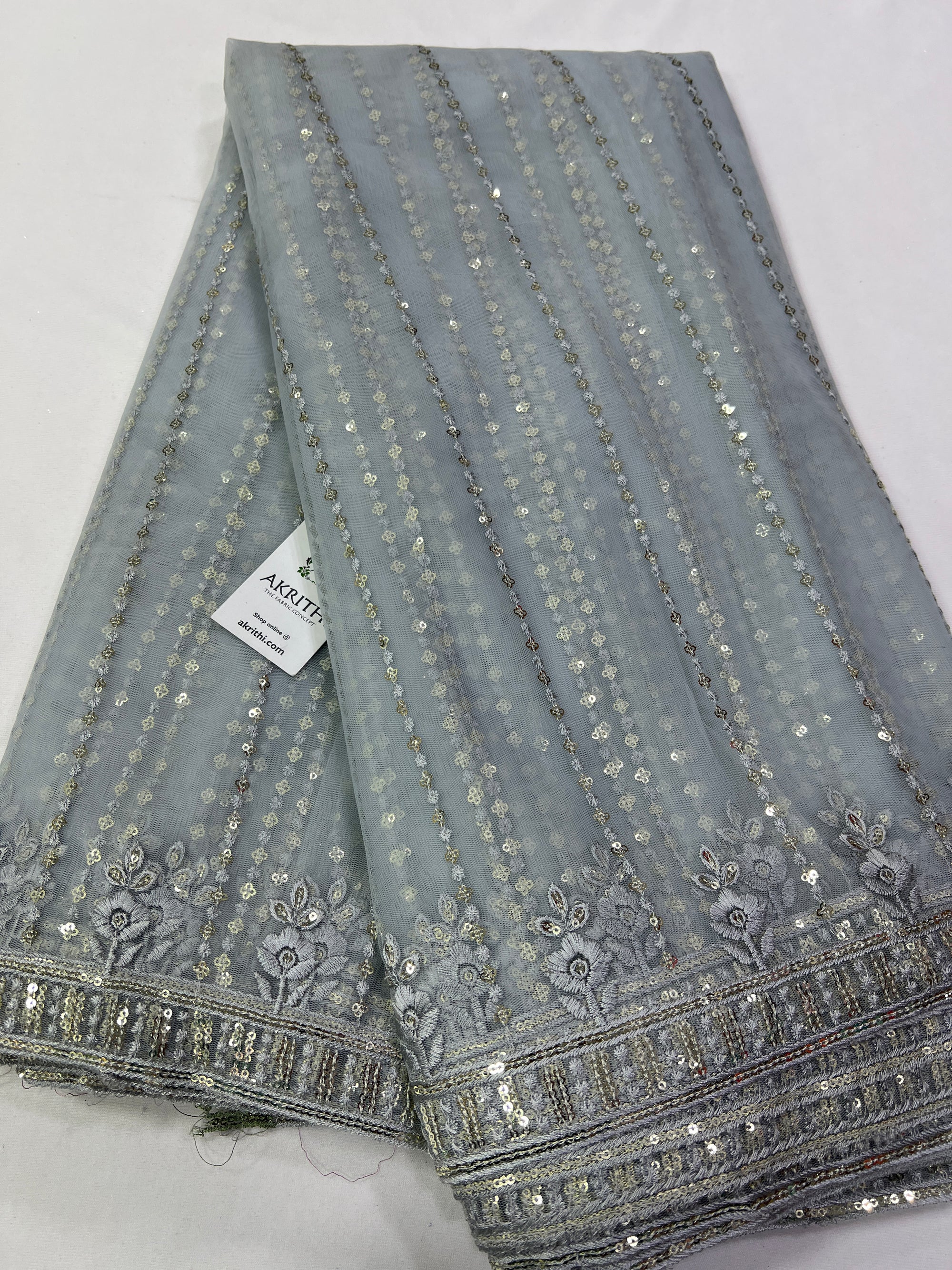 Embroidery on net fabric