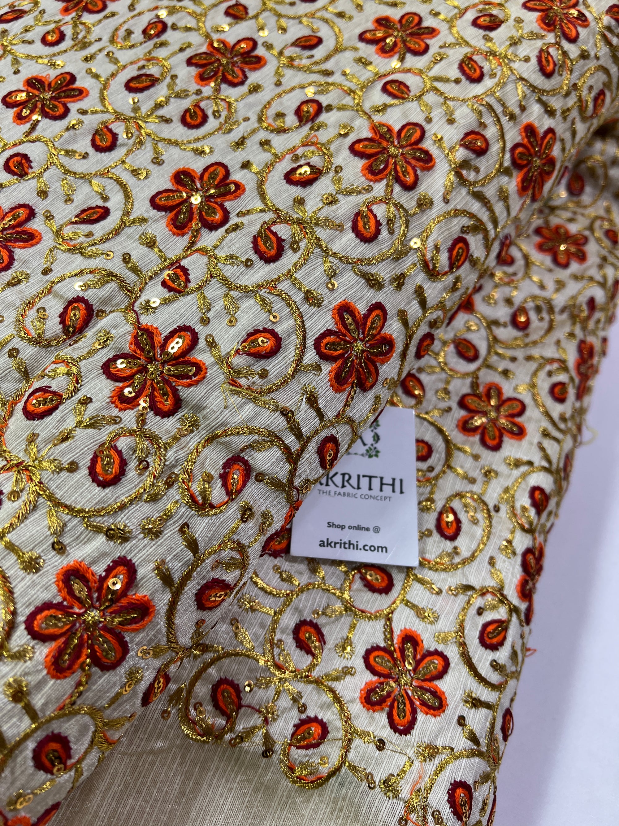 Embroidery on raw silk fabric