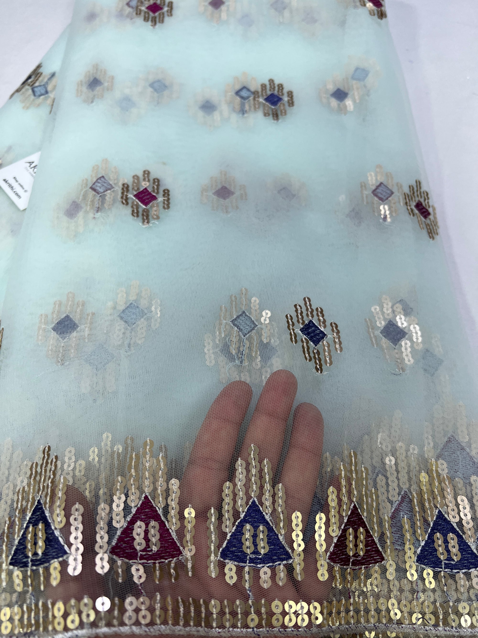 Embroidery on net fabric