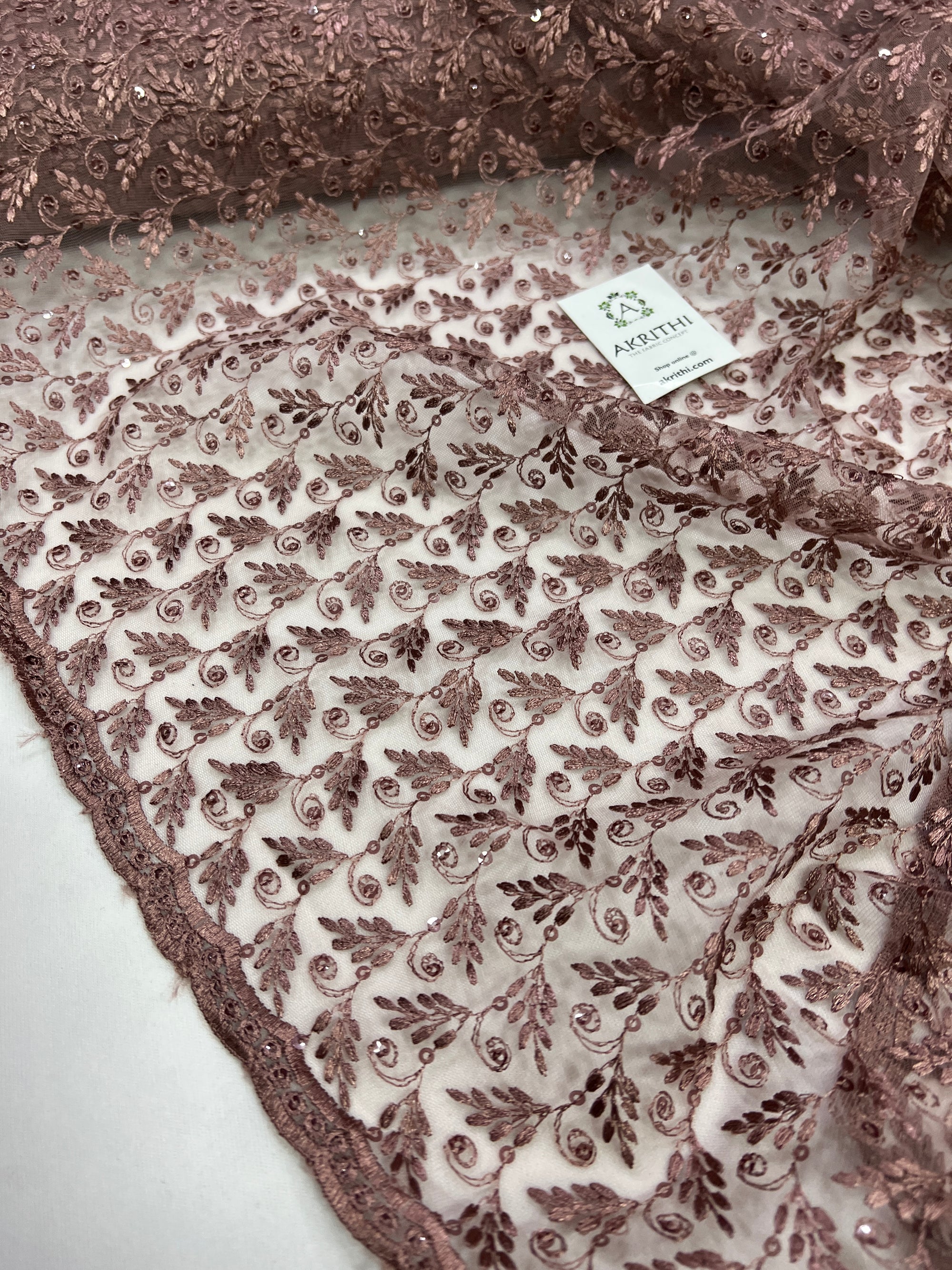 Embroidery on net fabric