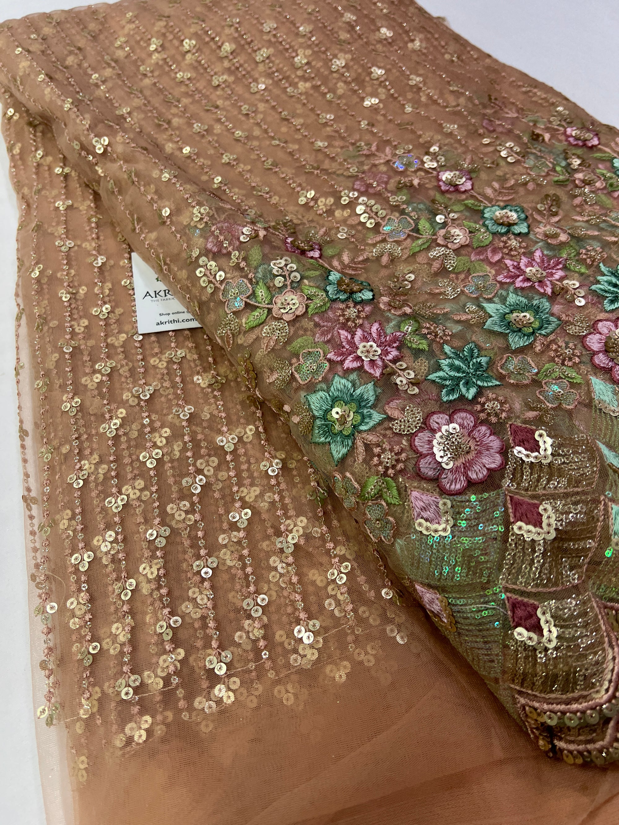 Embroidery on net fabric