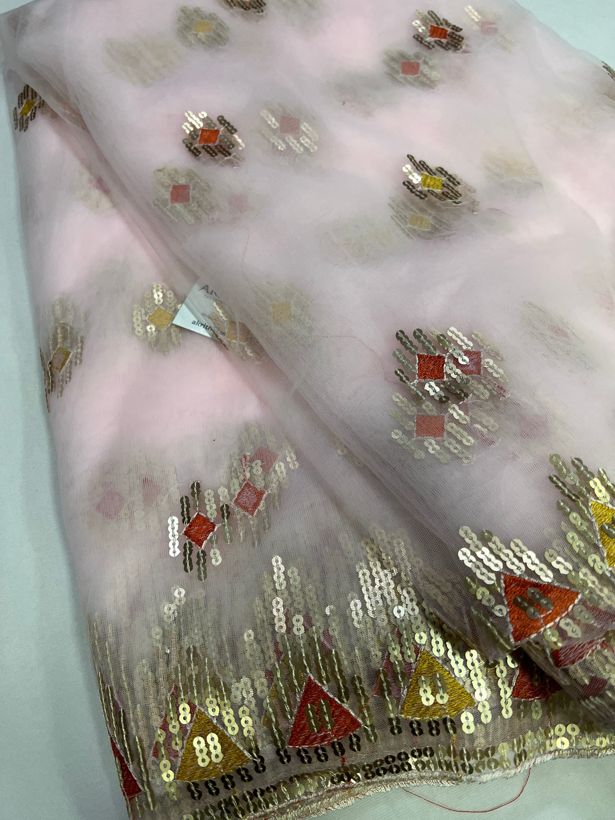 Embroidery on net fabric