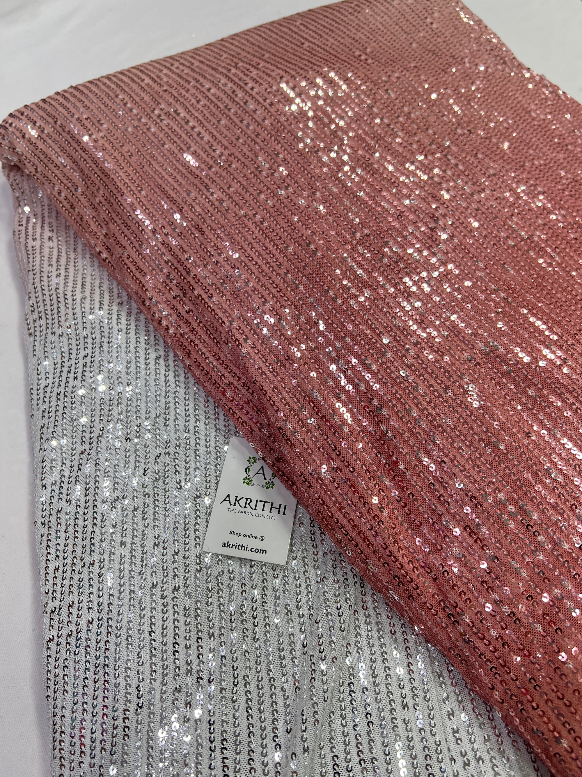 Sequins on shaded net fabric