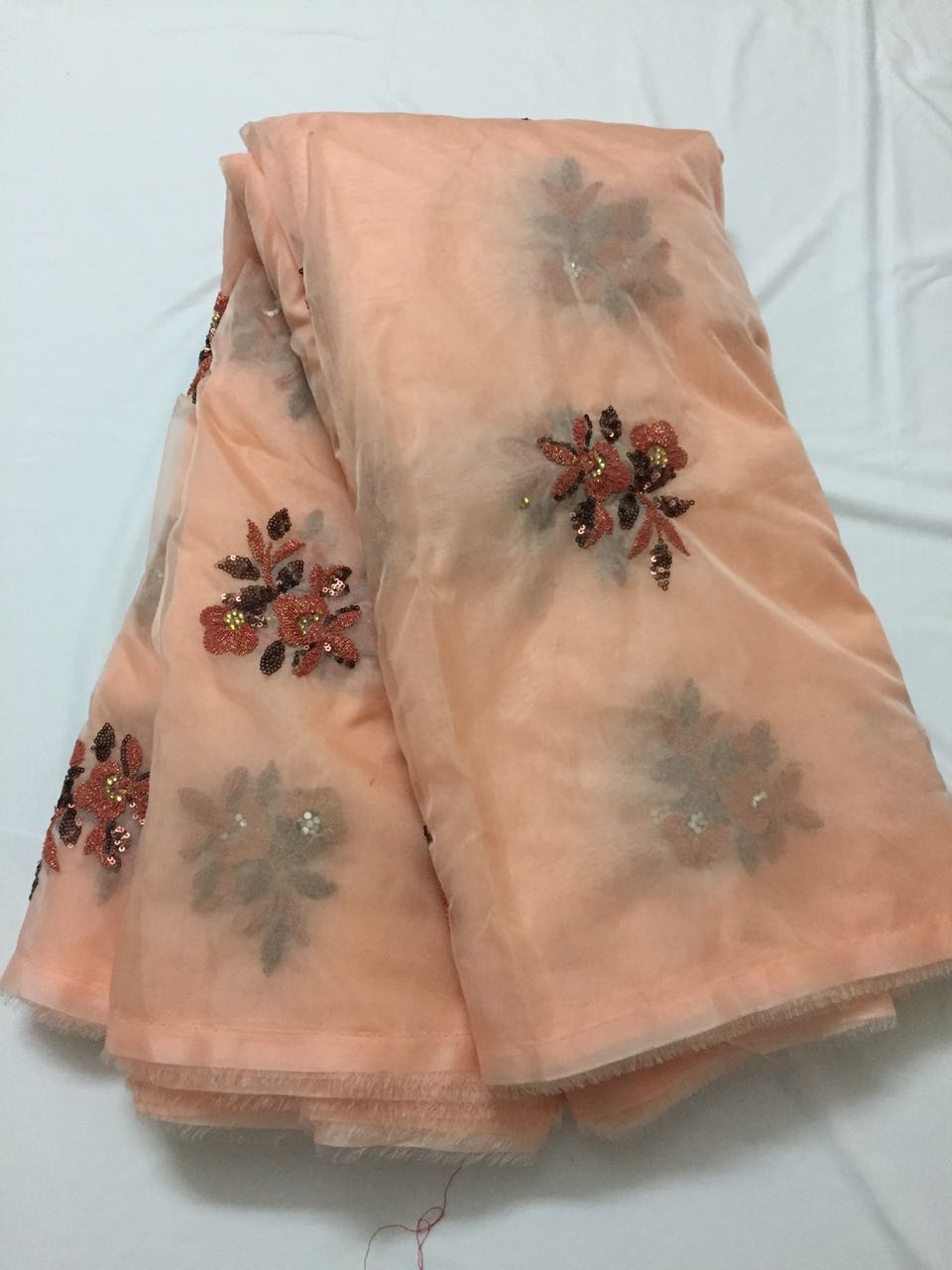 Embroidery on organza fabric