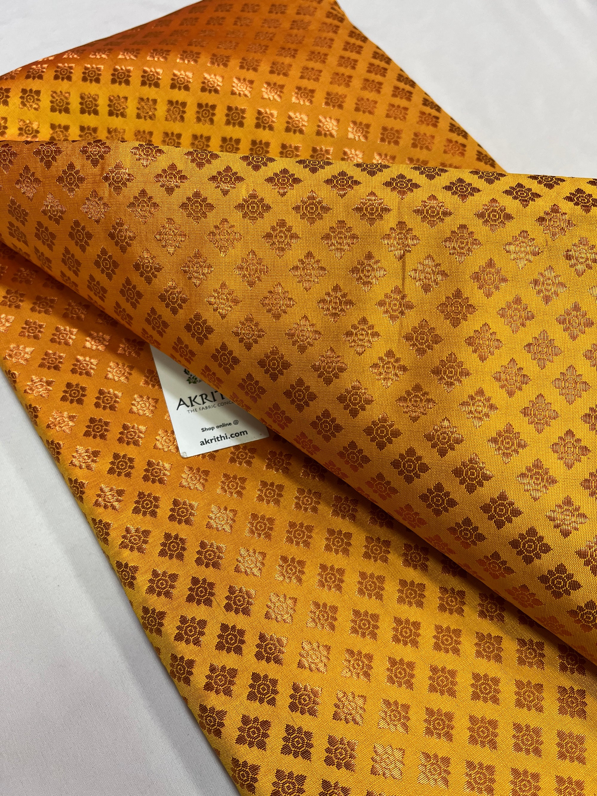 Banarasi brocade fabric with copper zari