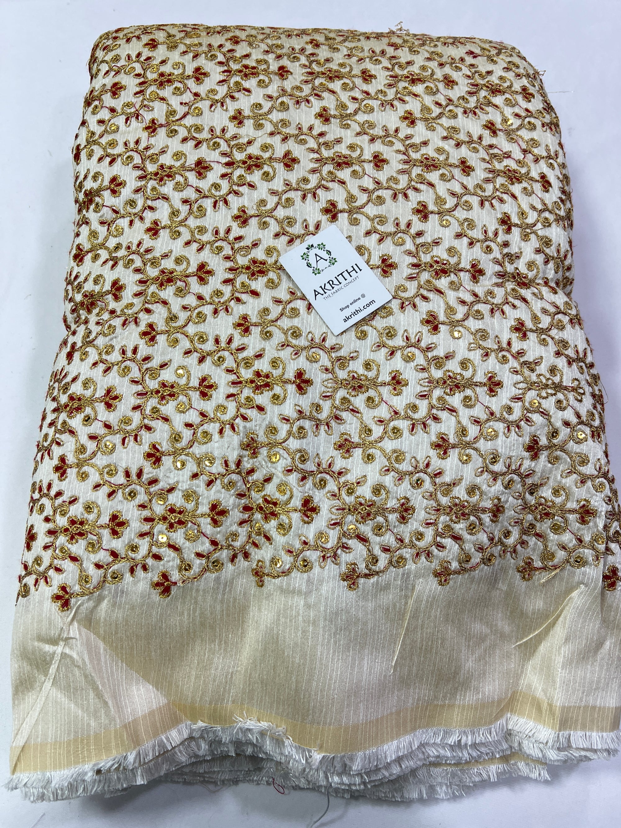 Embroidery on raw silk fabric
