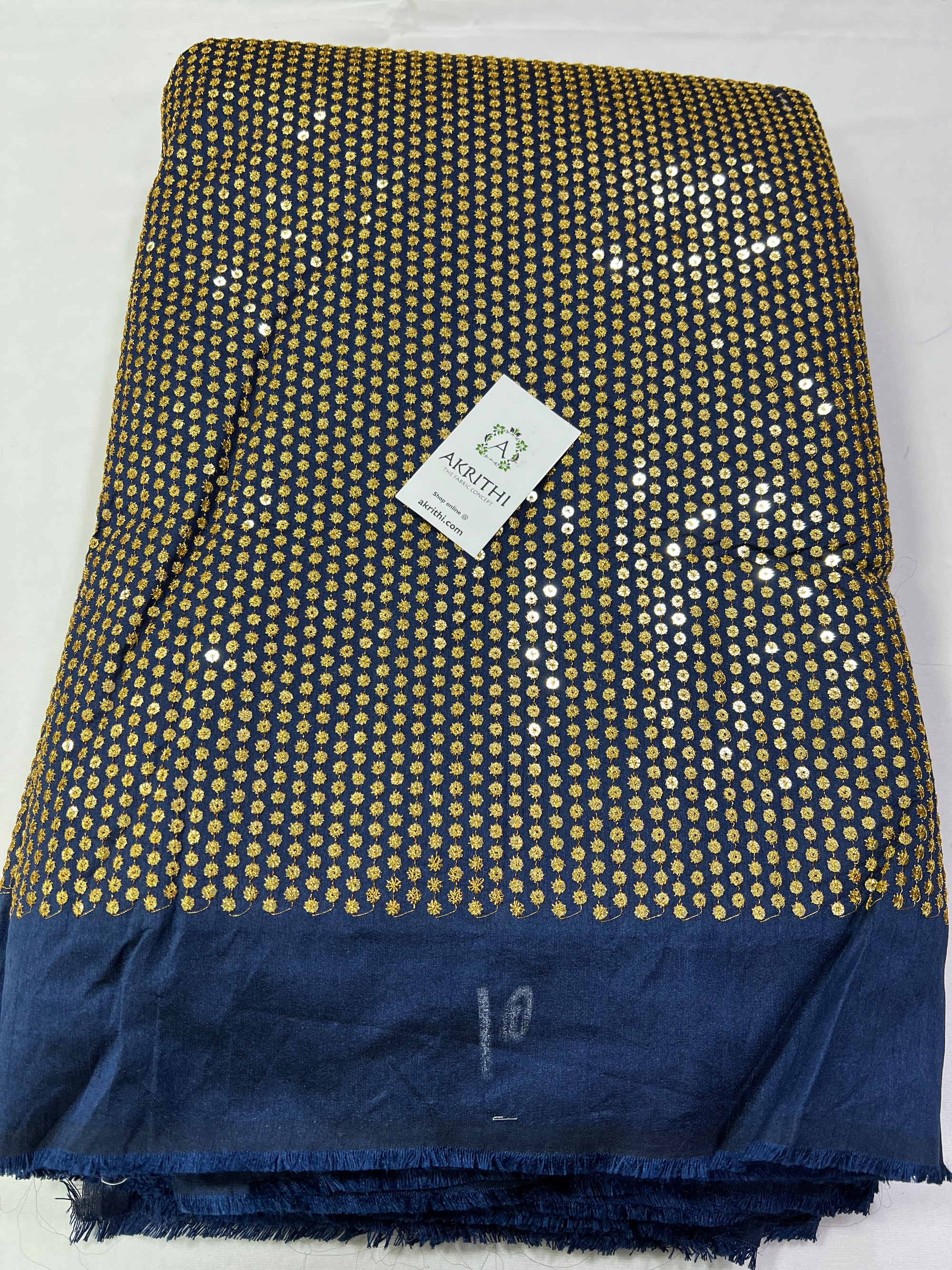 Embroidery on raw silk fabric