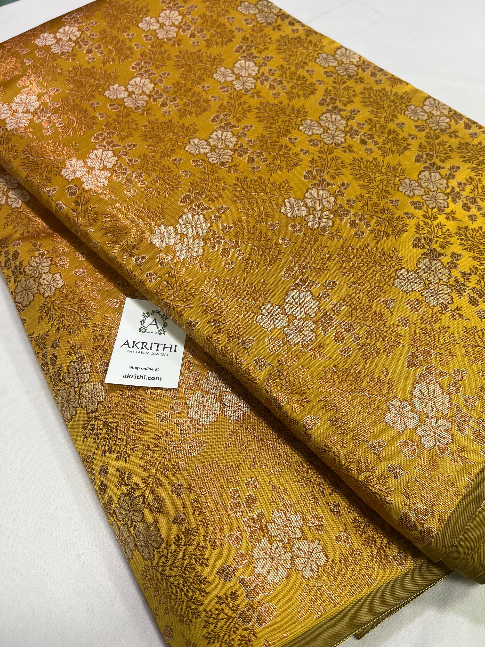 Banarasi brocade fabric with copper zari