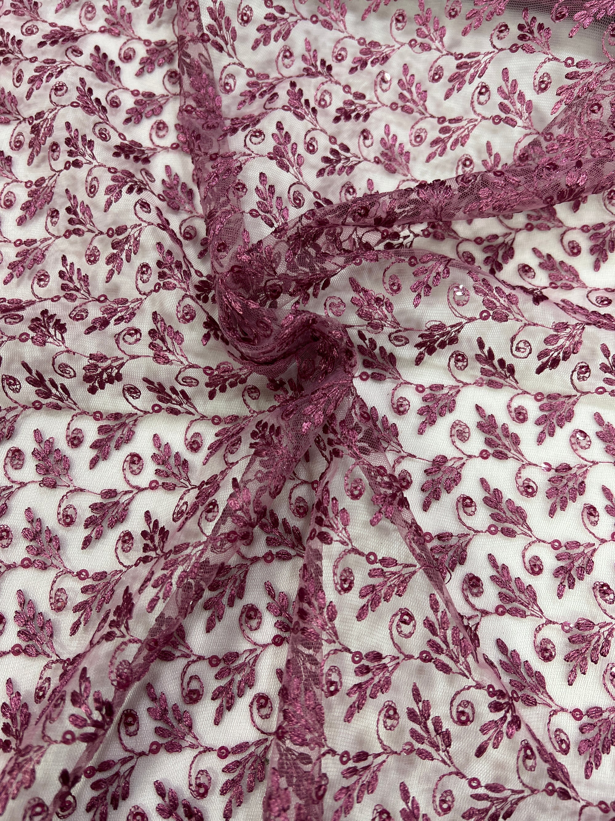 Embroidery on net fabric