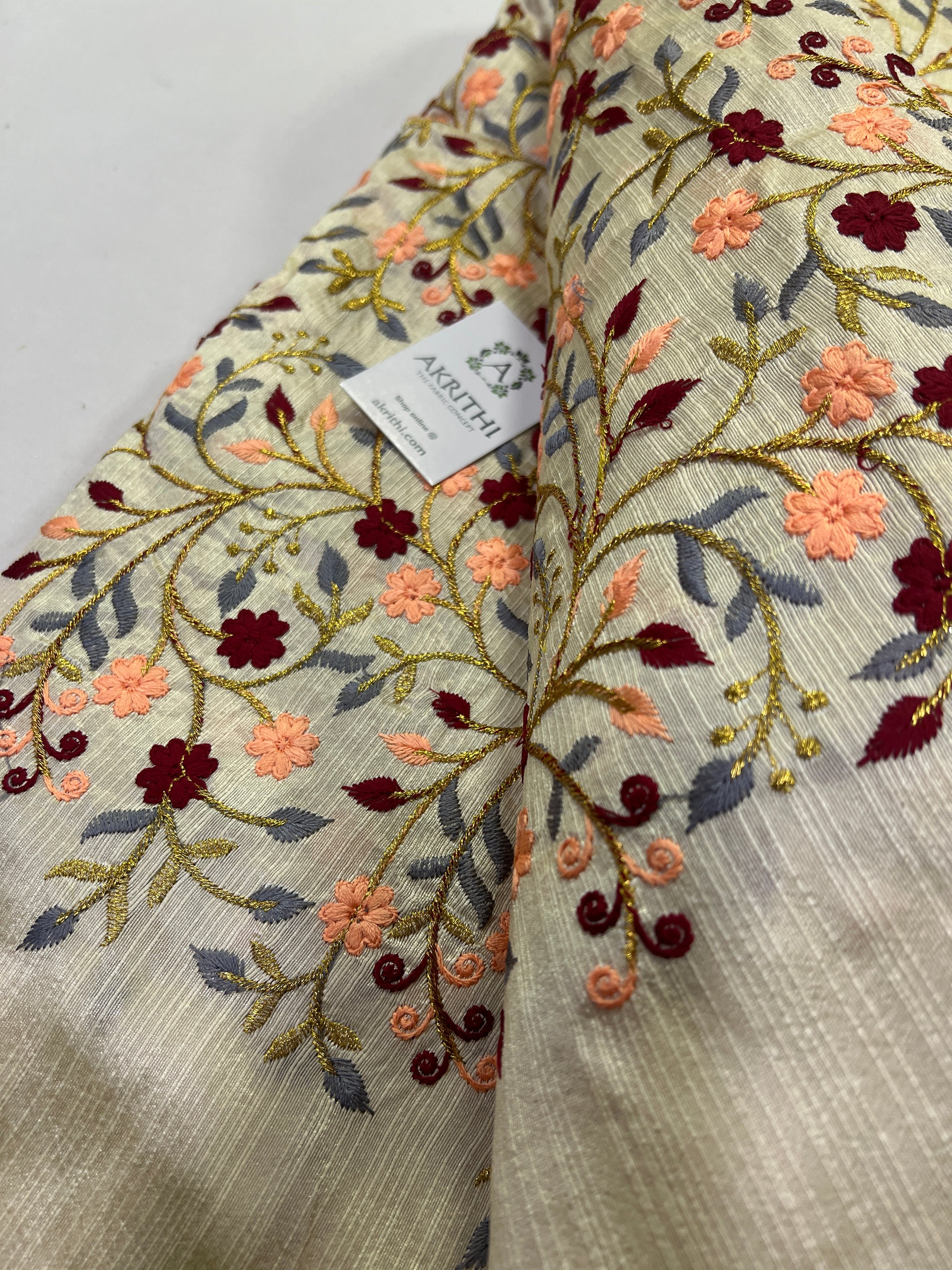Embroidery on raw silk fabric