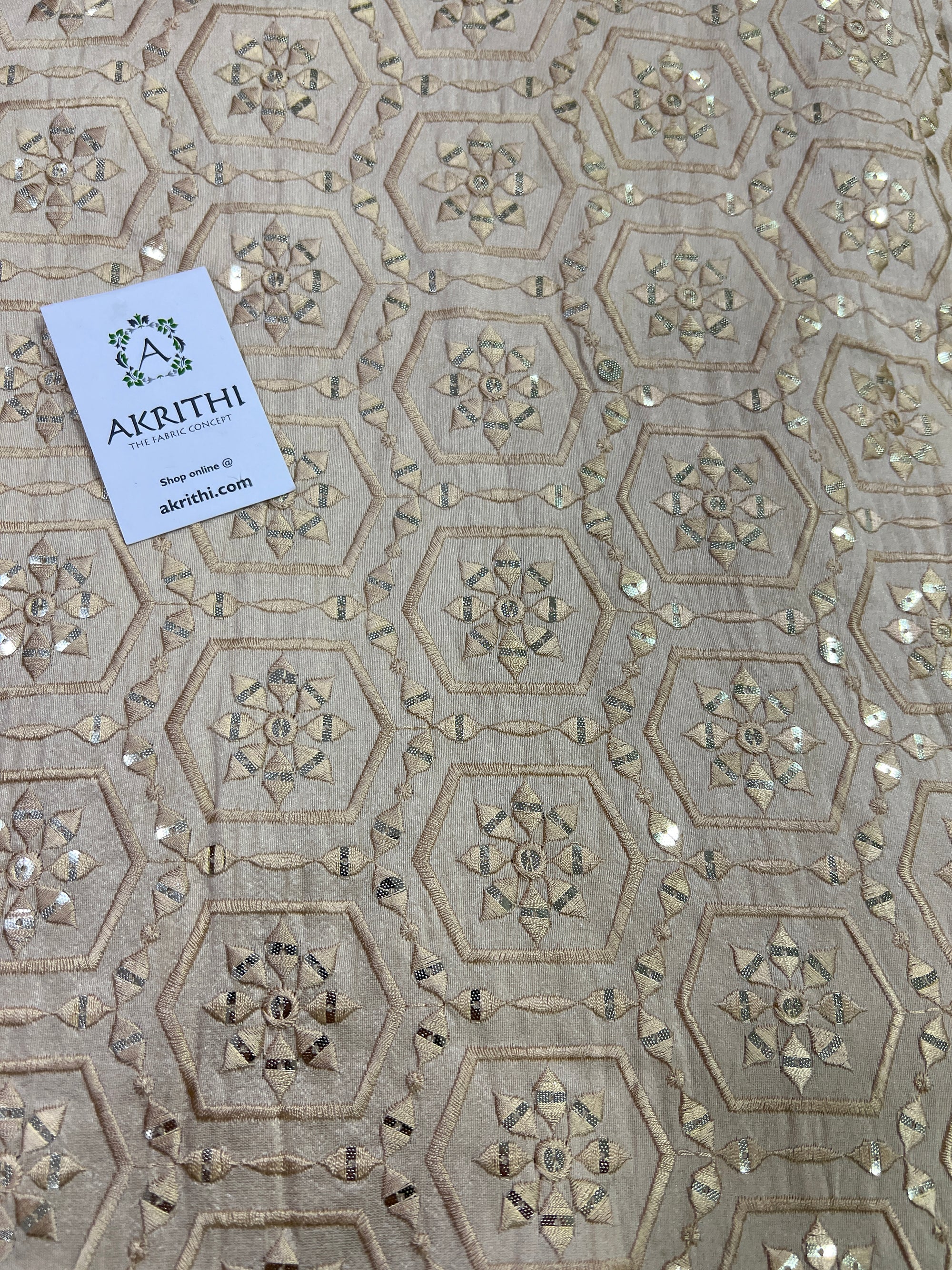 Embroidery on raw silk fabric