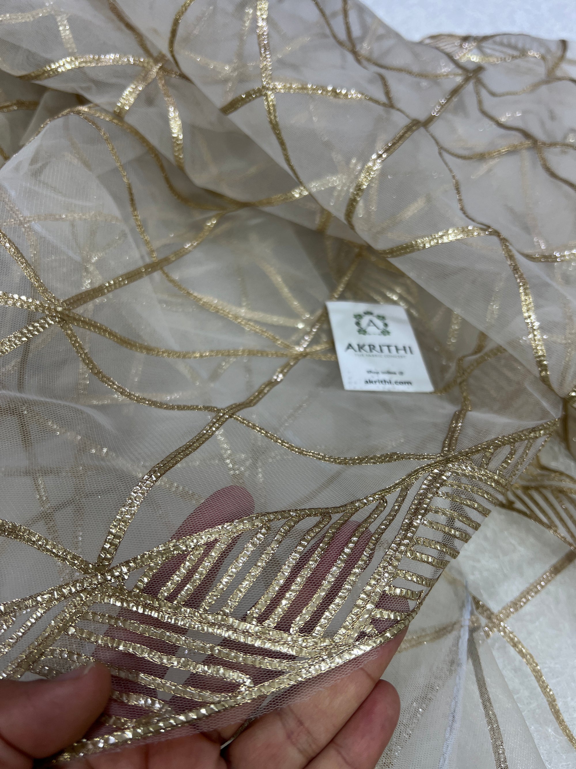 Embroidery on net fabric