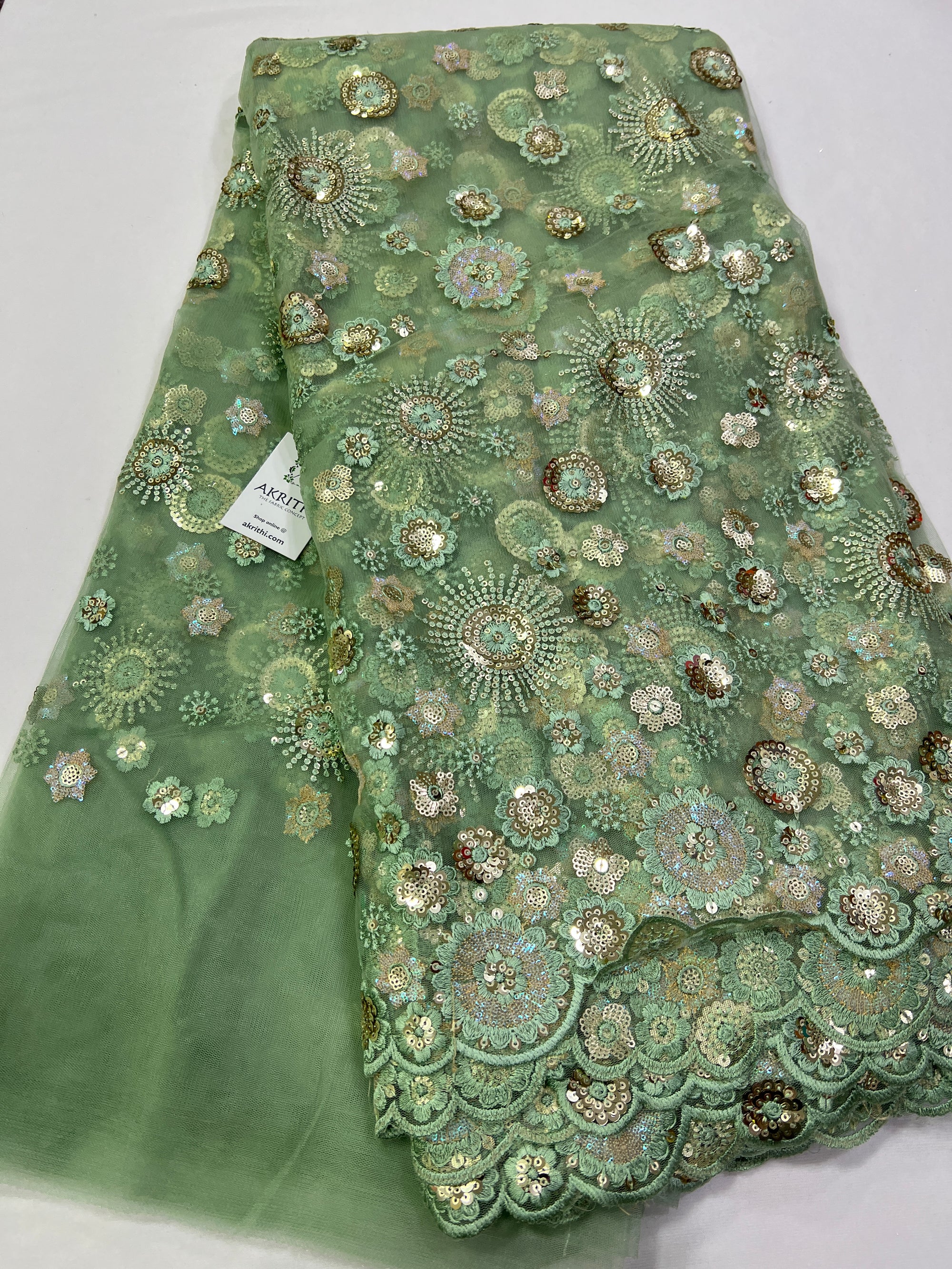 Embroidery on net fabric