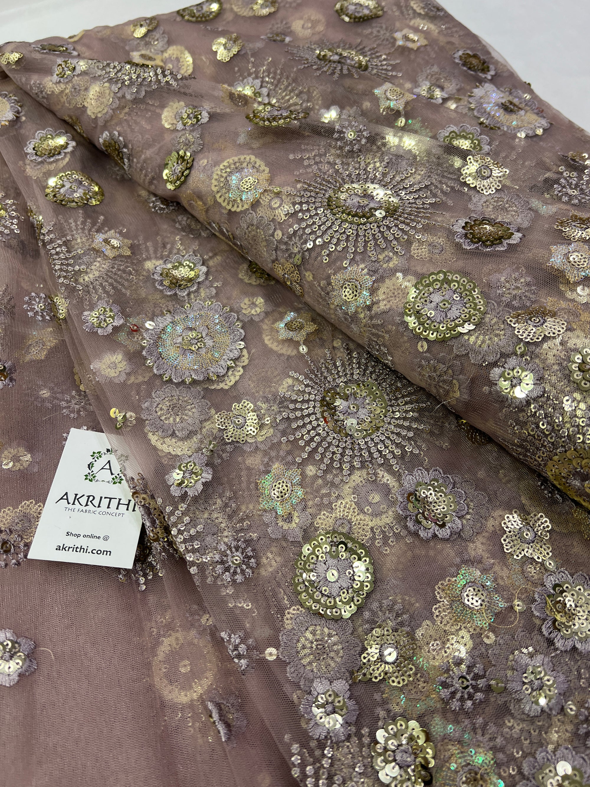 Embroidery on net fabric