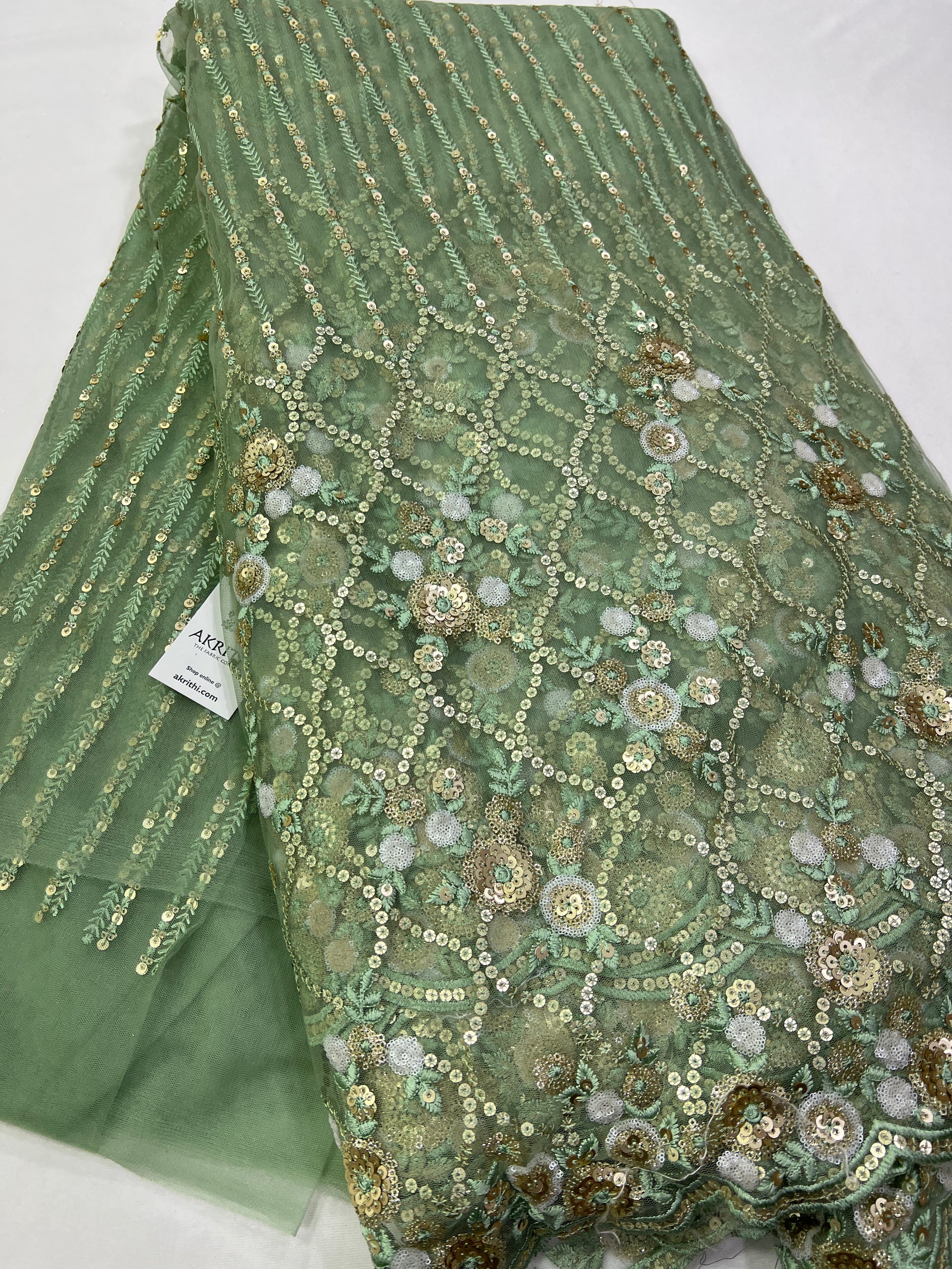 Embroidery on net fabric