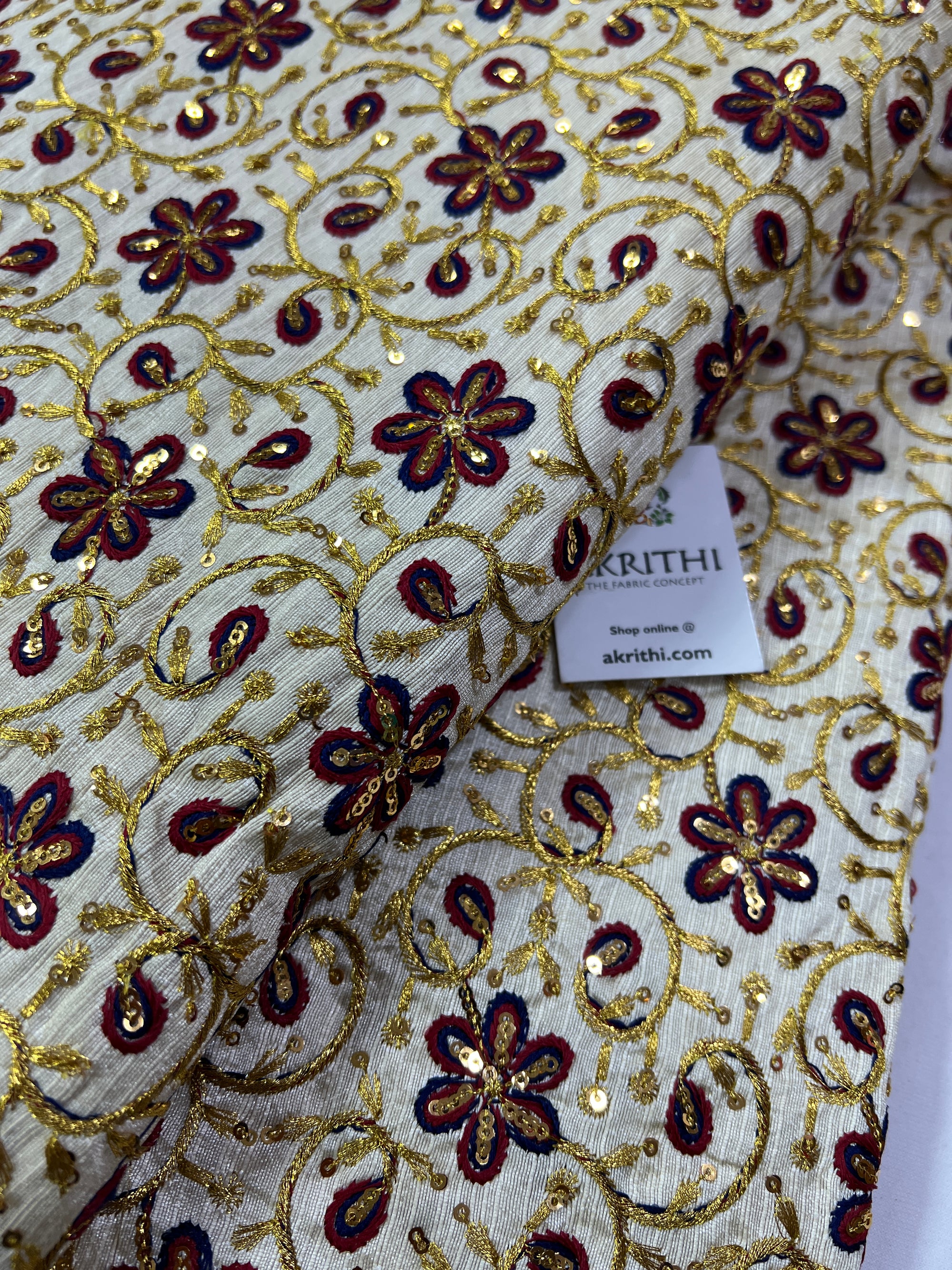 Embroidery on raw silk fabric