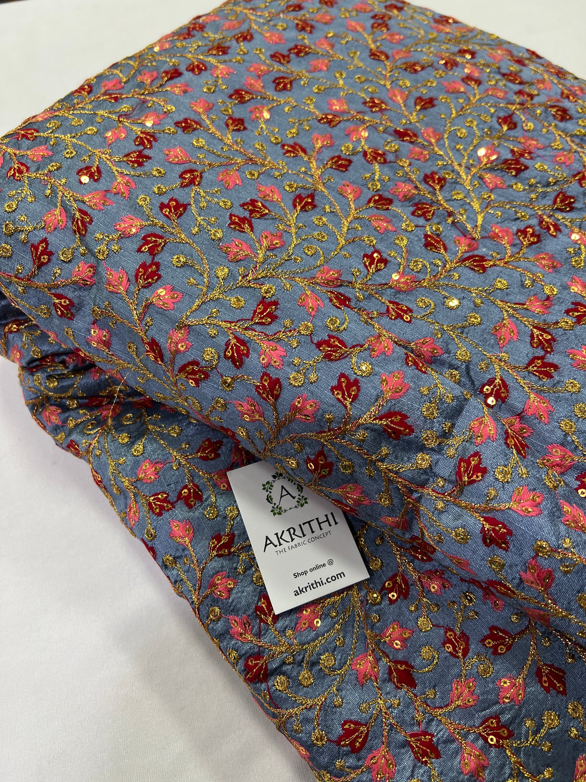 Embroidery on raw silk fabric