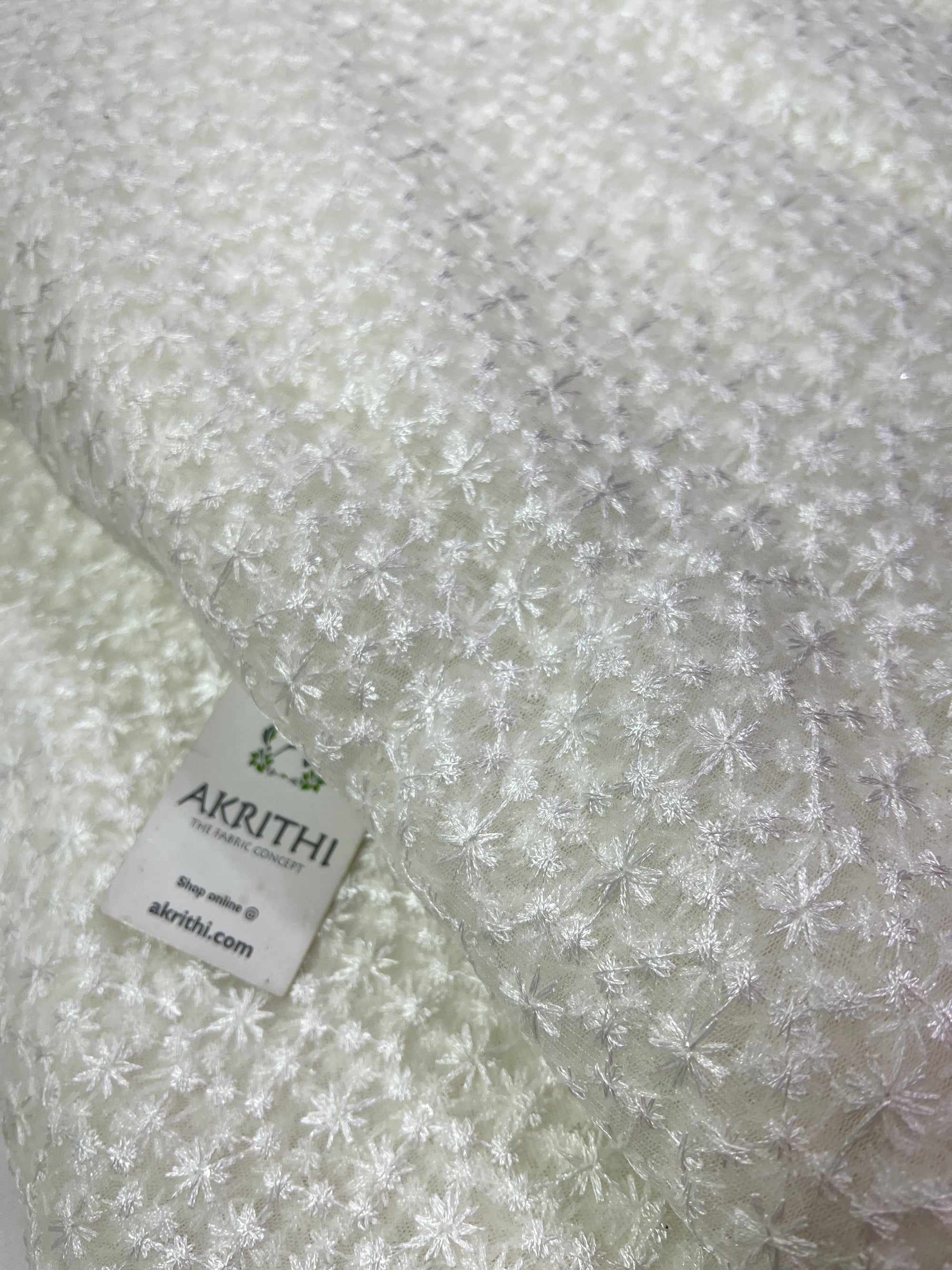 Embroidery on net fabric