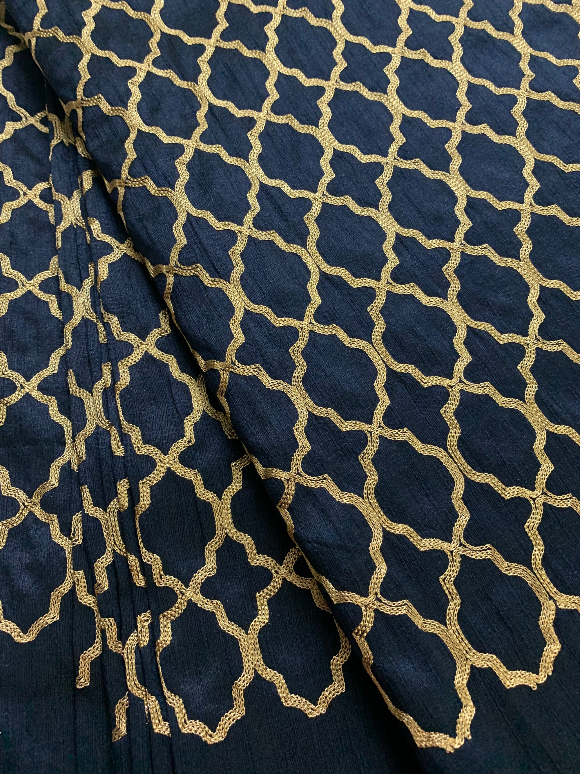 Embroidery on navy blue raw silk fabric