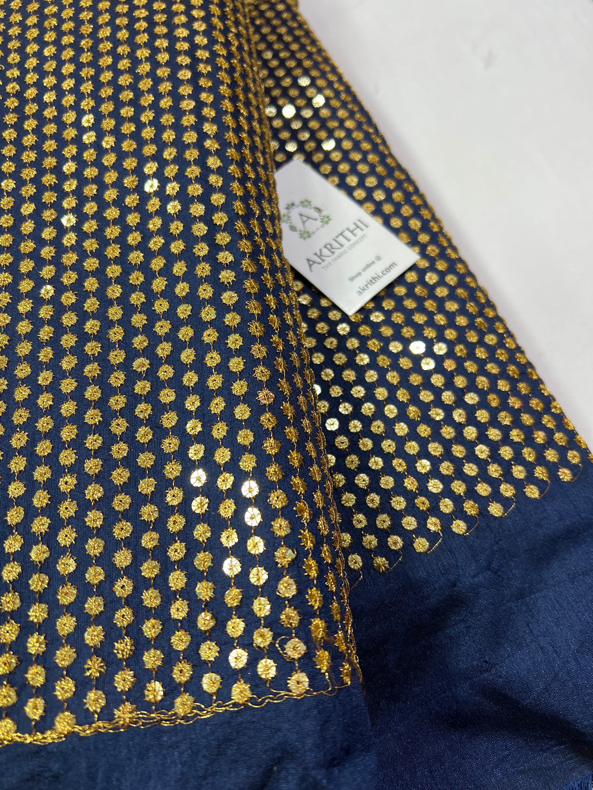 Embroidery on raw silk fabric