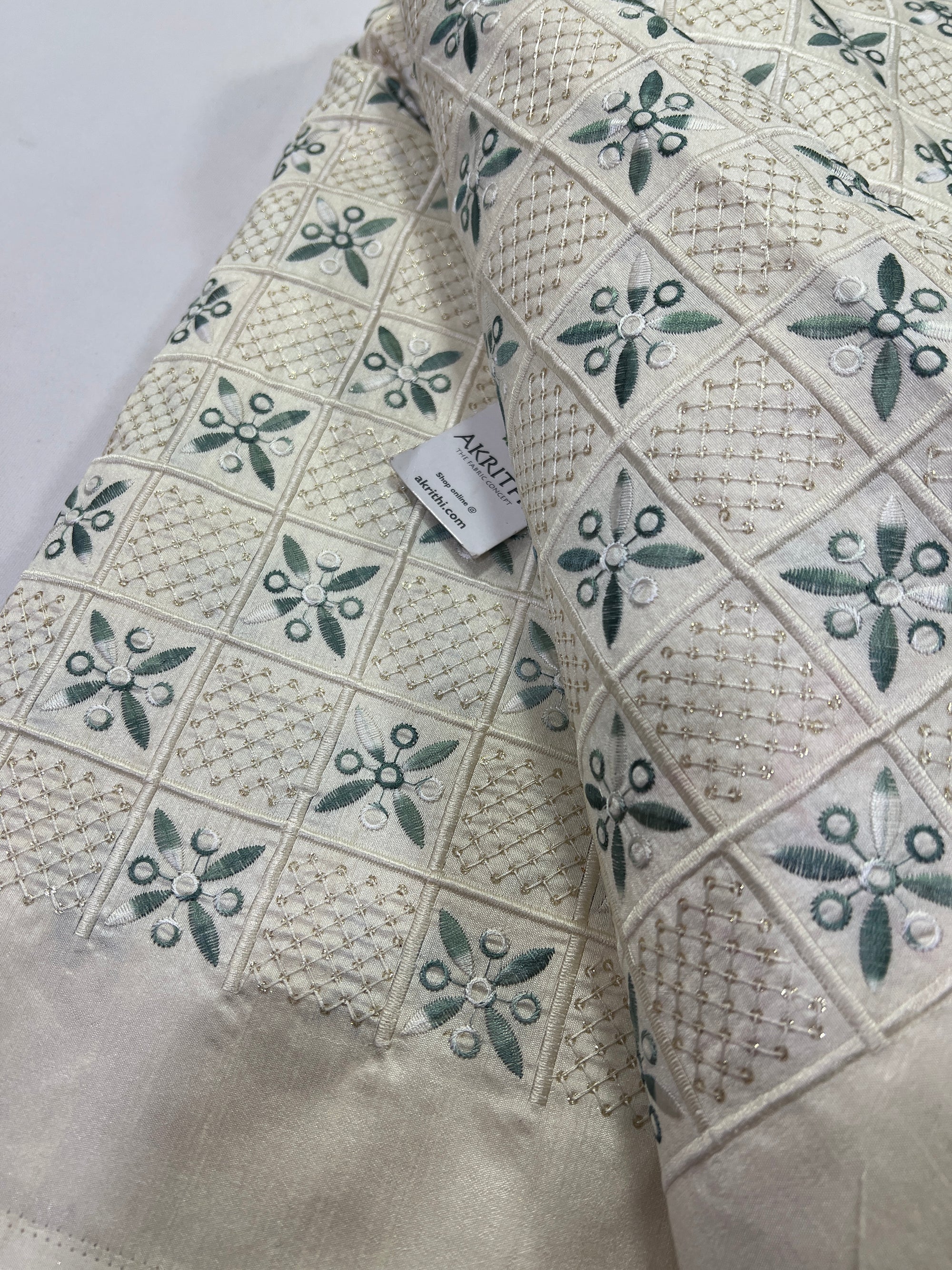Embroidery on raw silk fabric