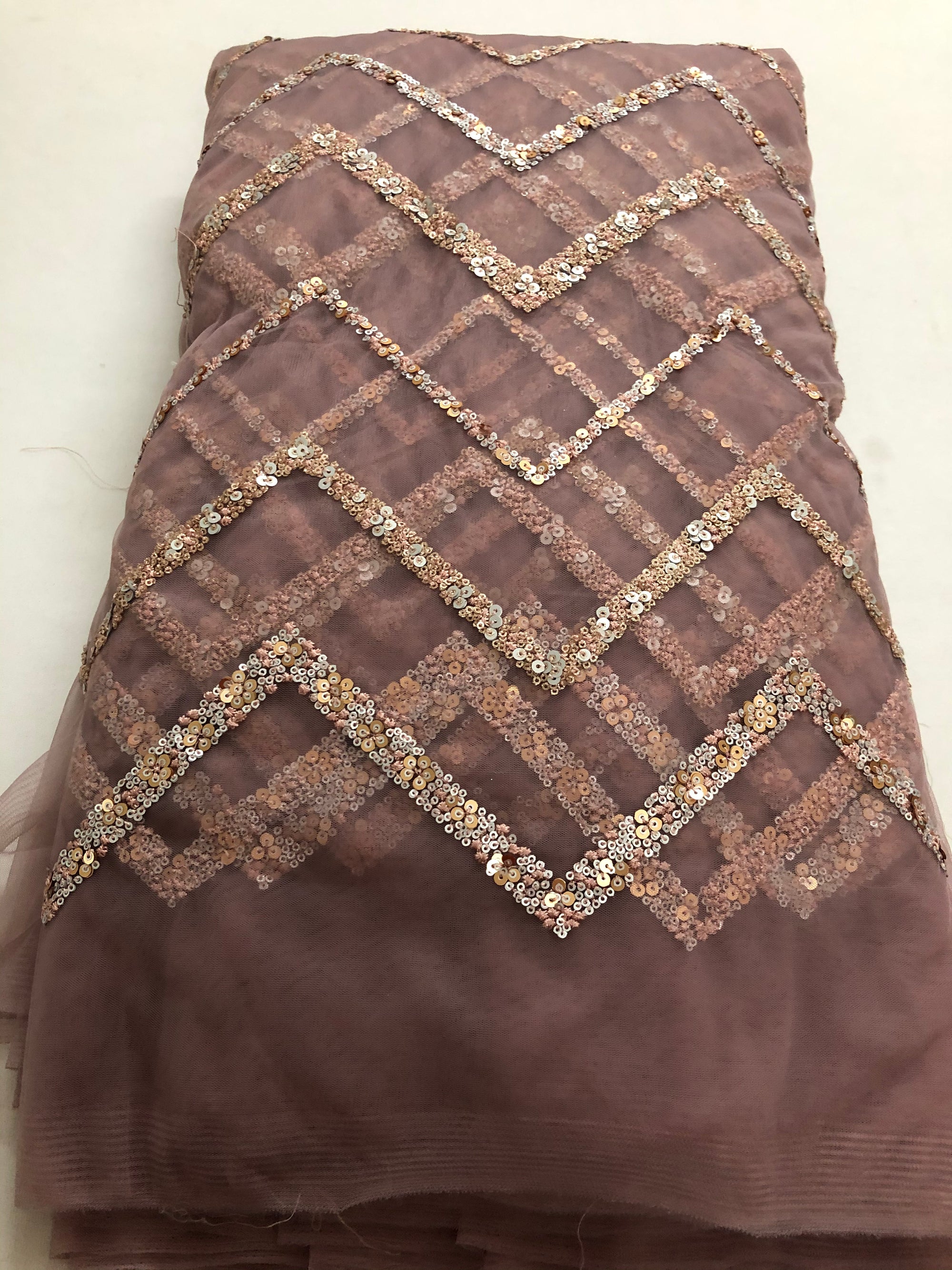 Embroidery on net fabric