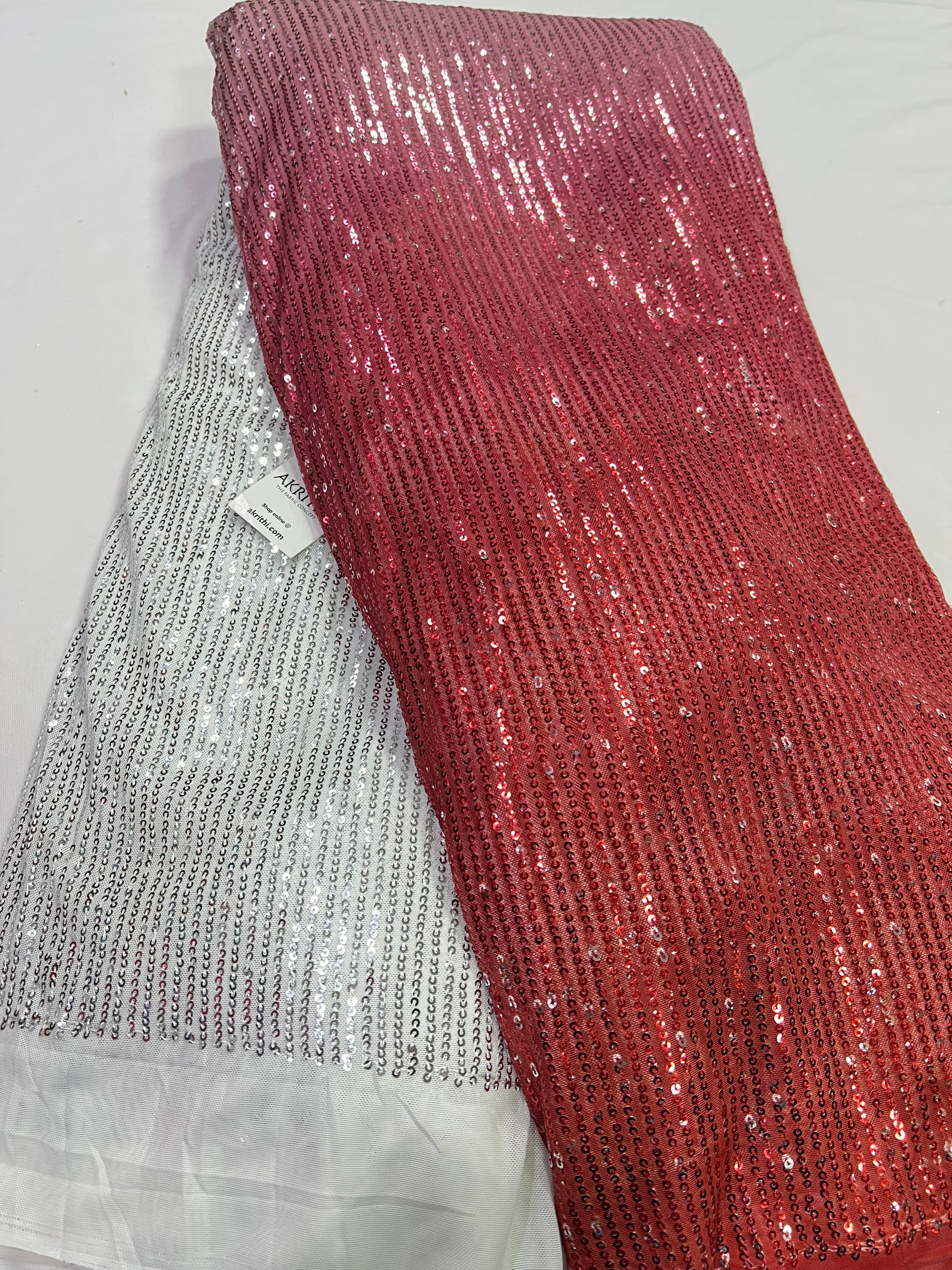 Sequins on shaded net fabric