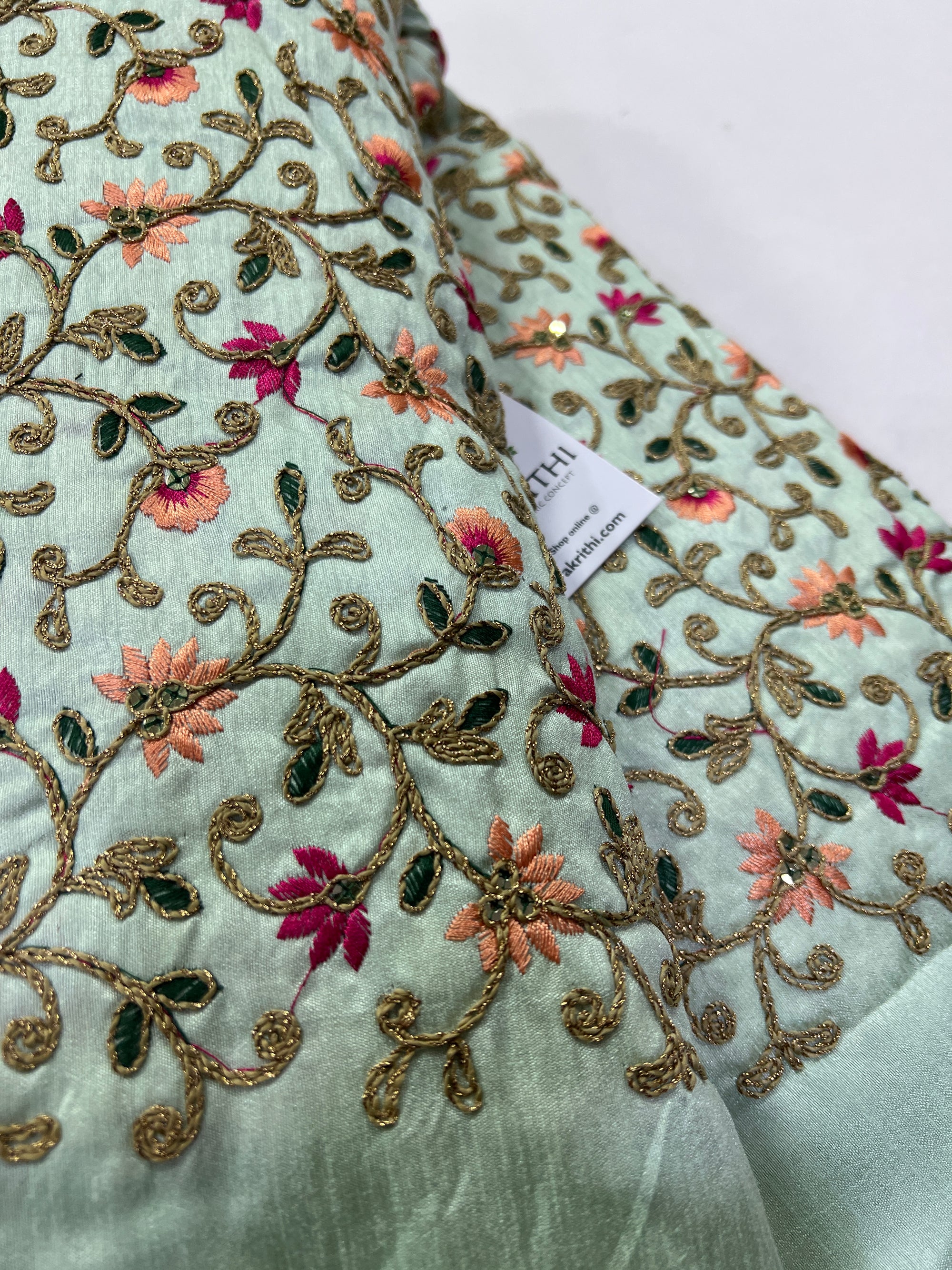 Embroidery on raw silk fabric