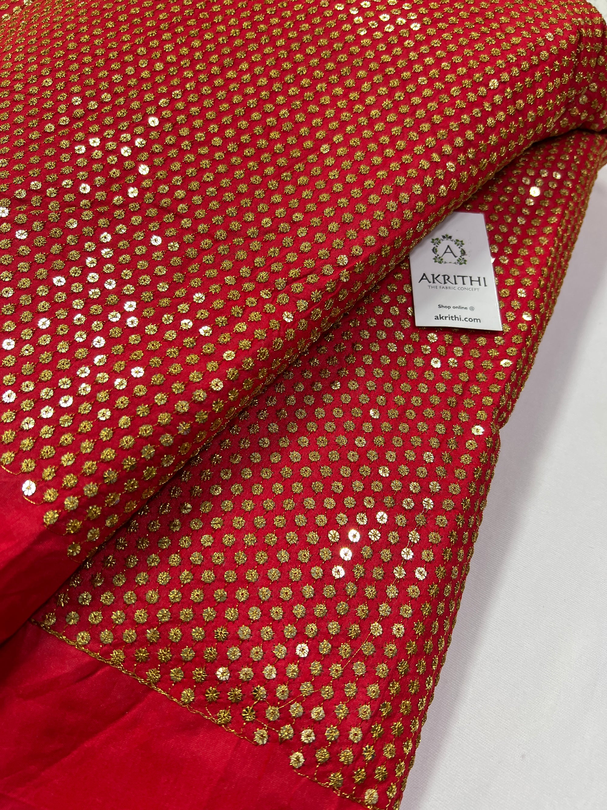 Embroidery on raw silk fabric