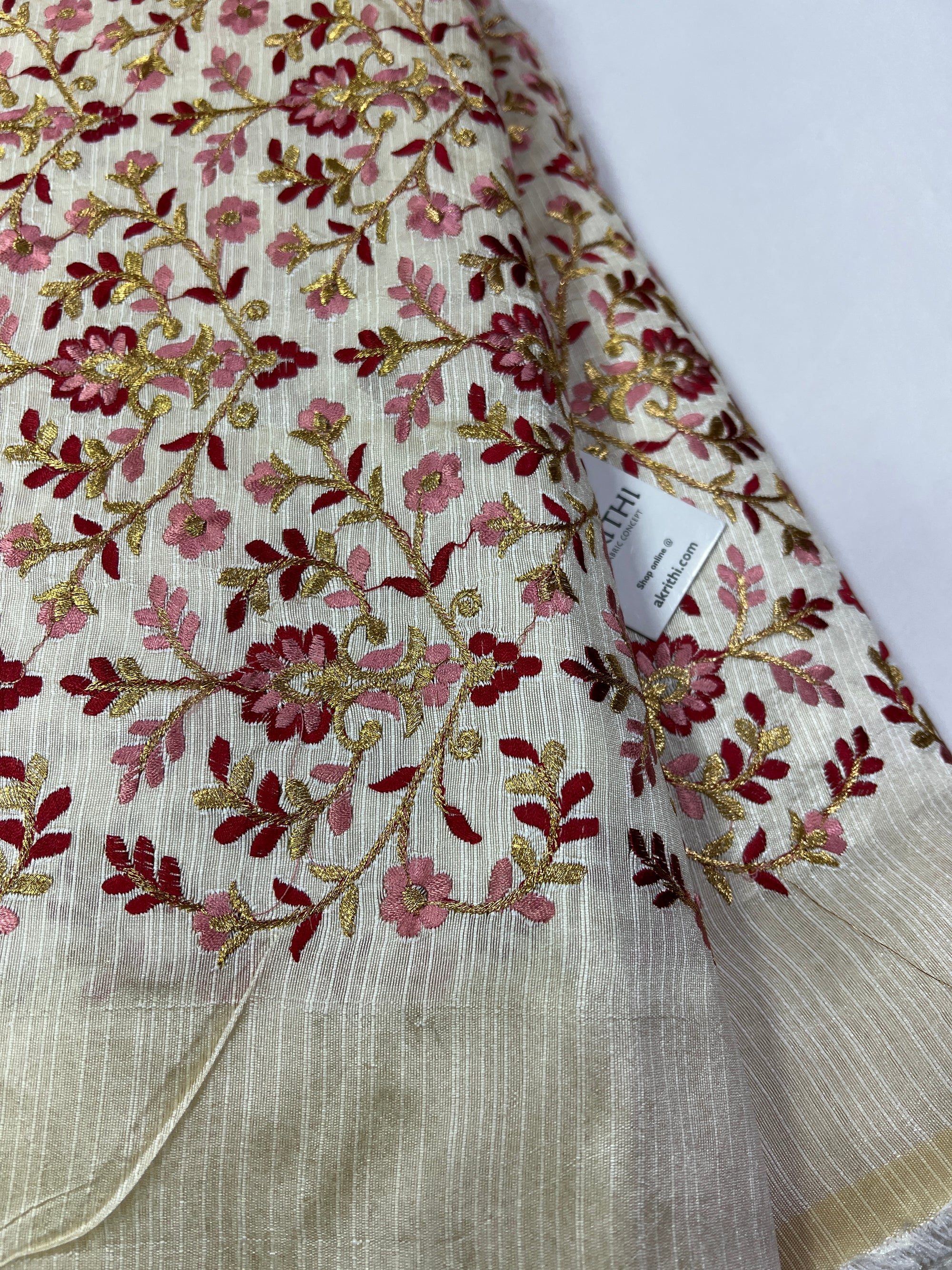 Embroidery on raw silk fabric