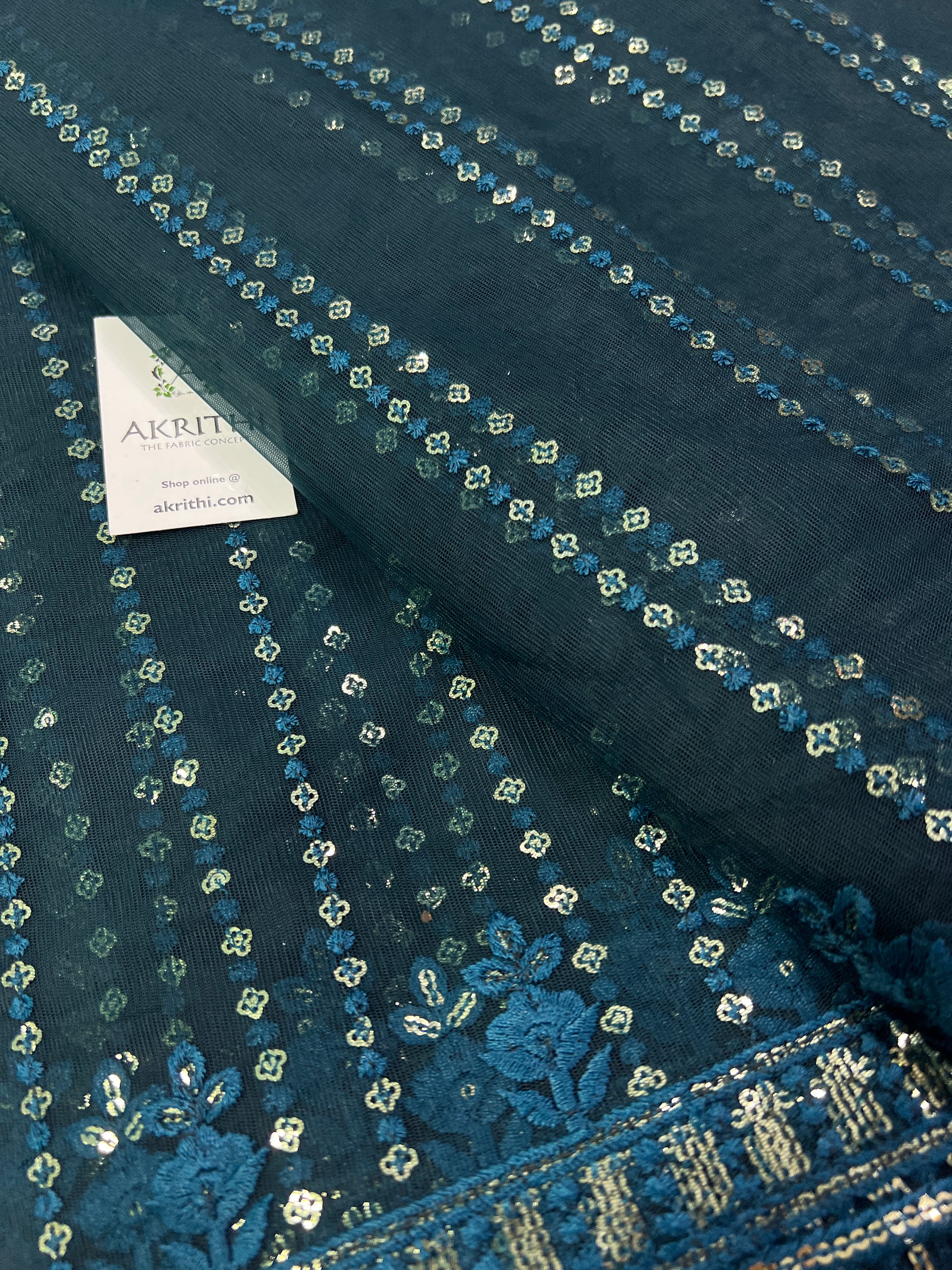 Embroidery on net fabric