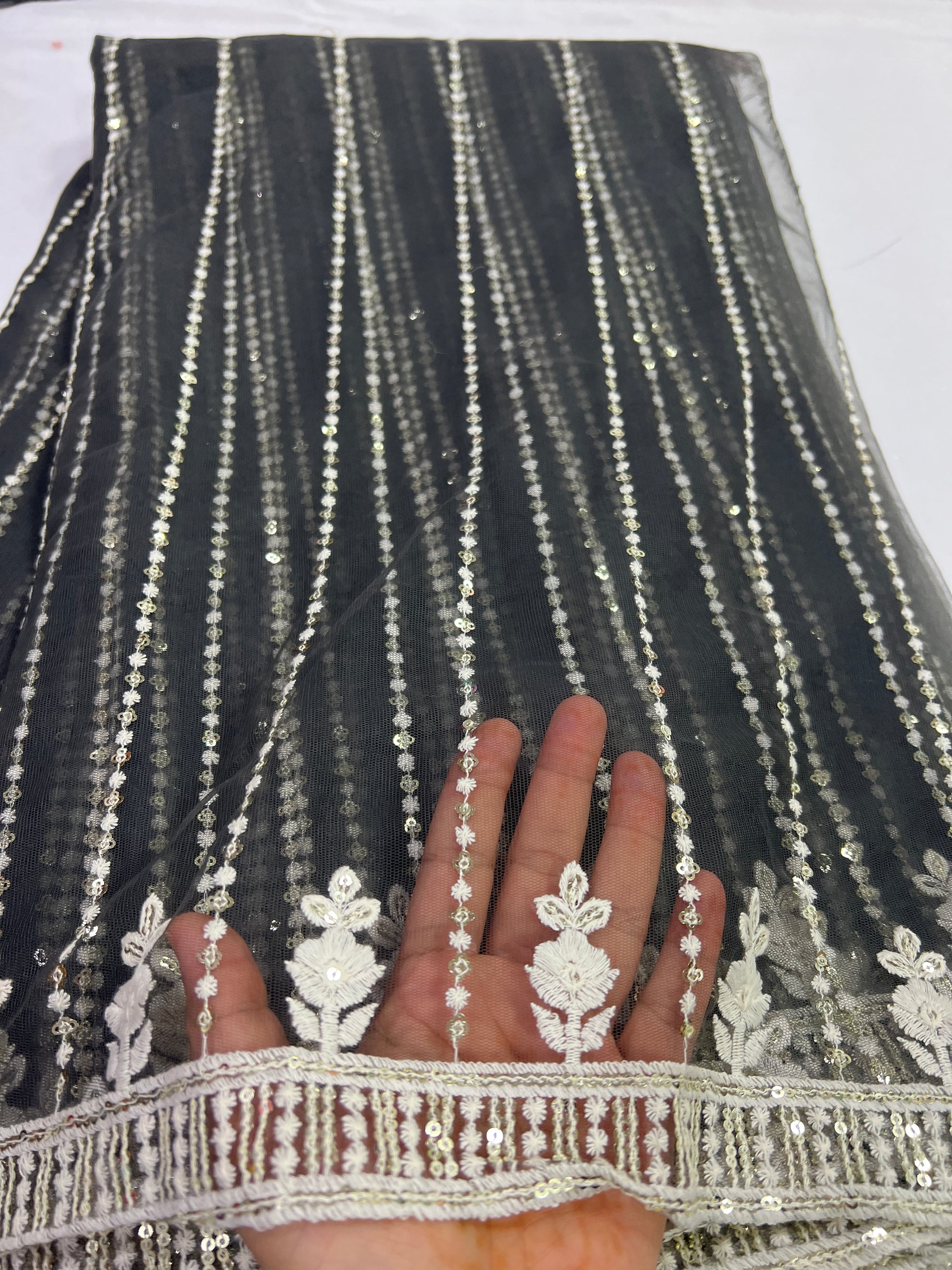 Embroidery on net fabric