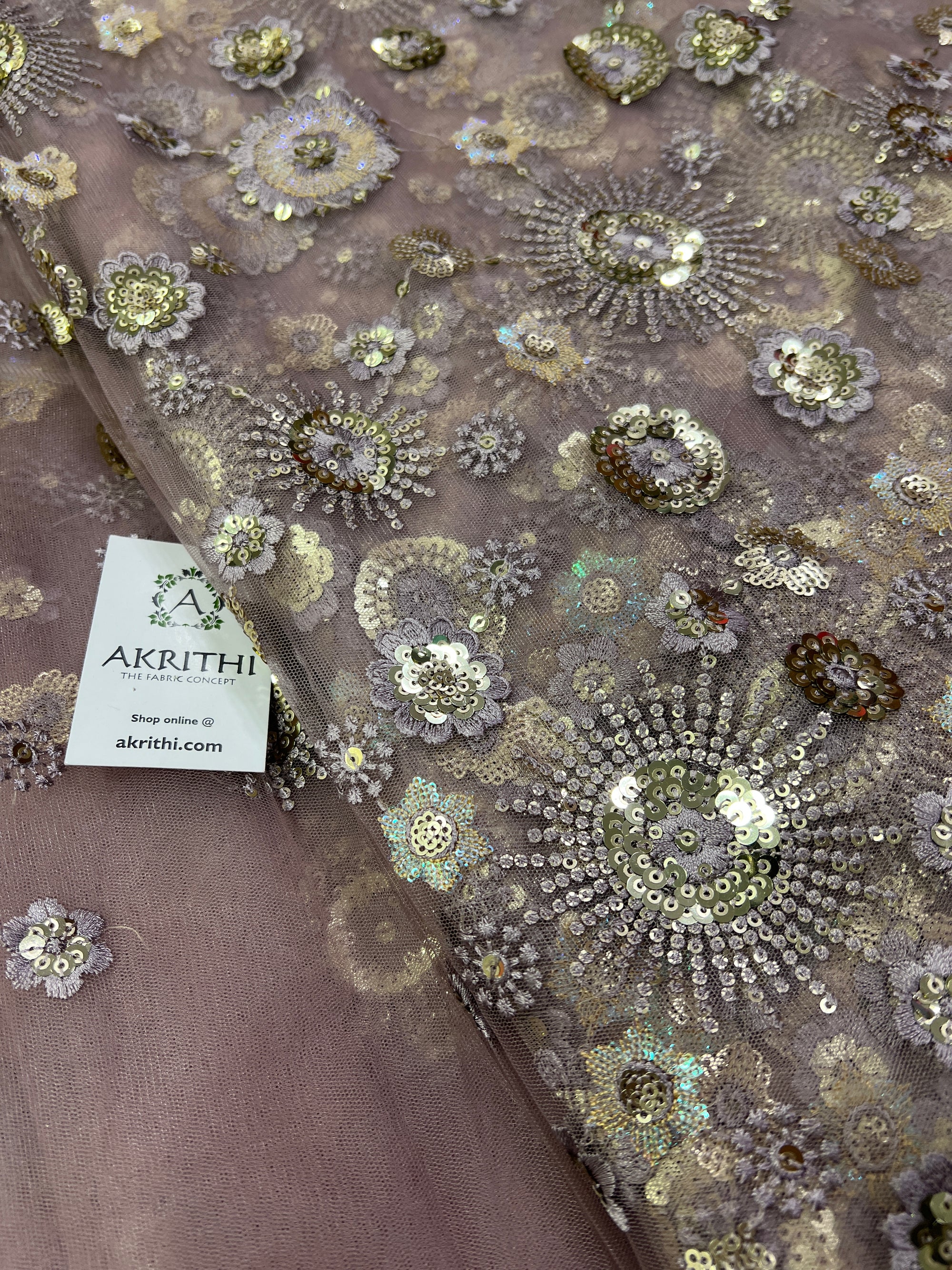Embroidery on net fabric