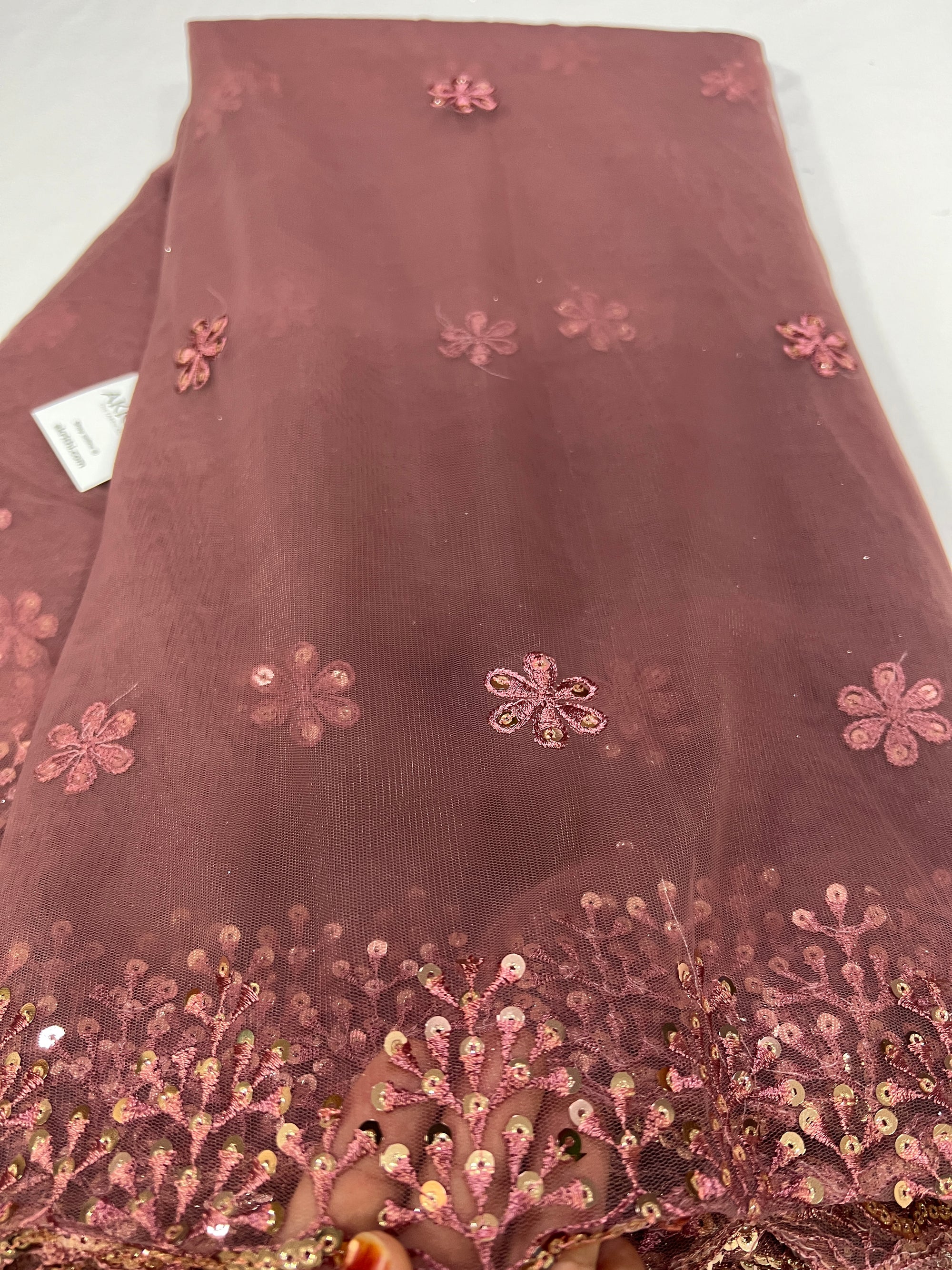 Embroidery on net fabric