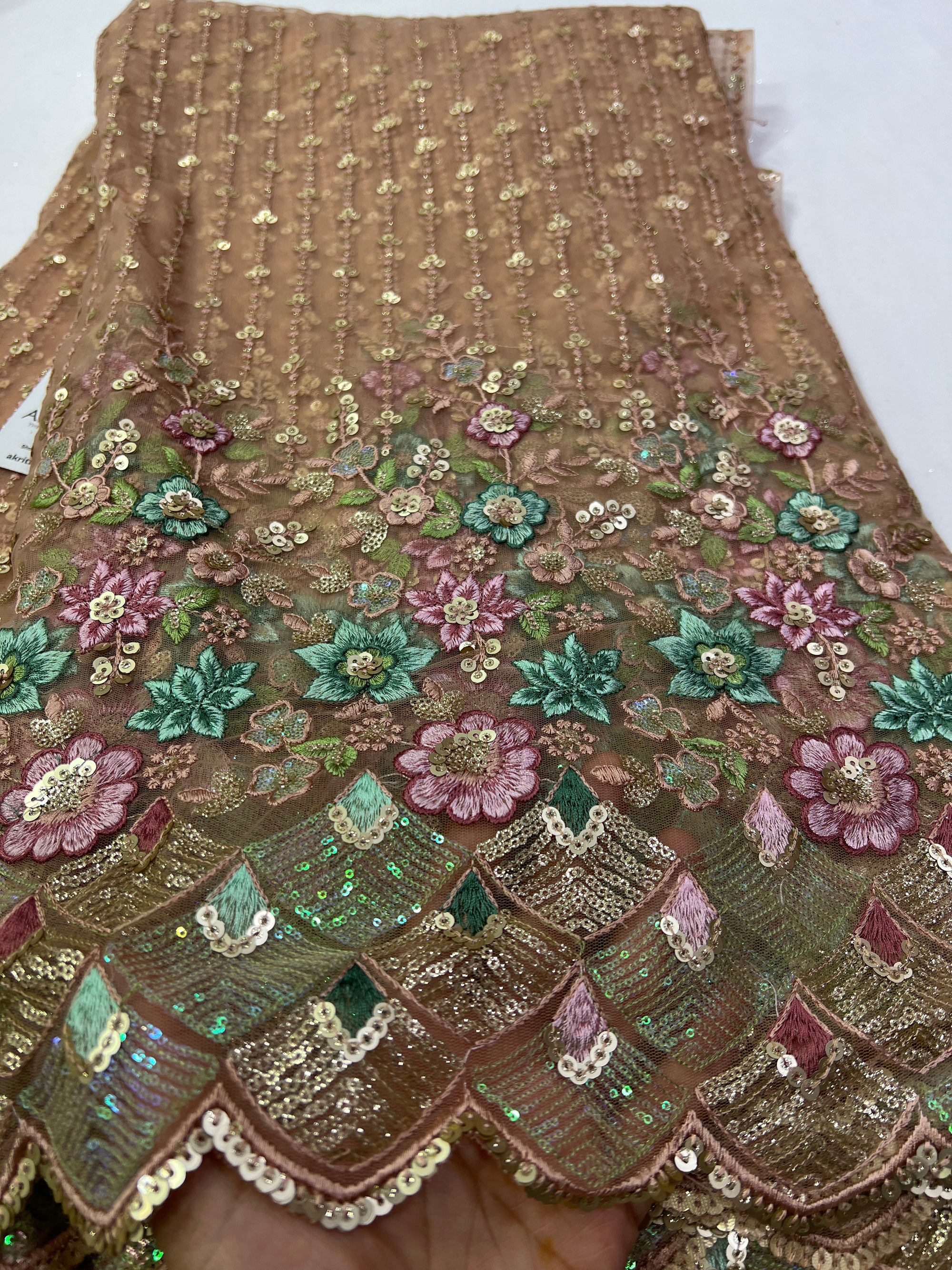 Embroidery on net fabric