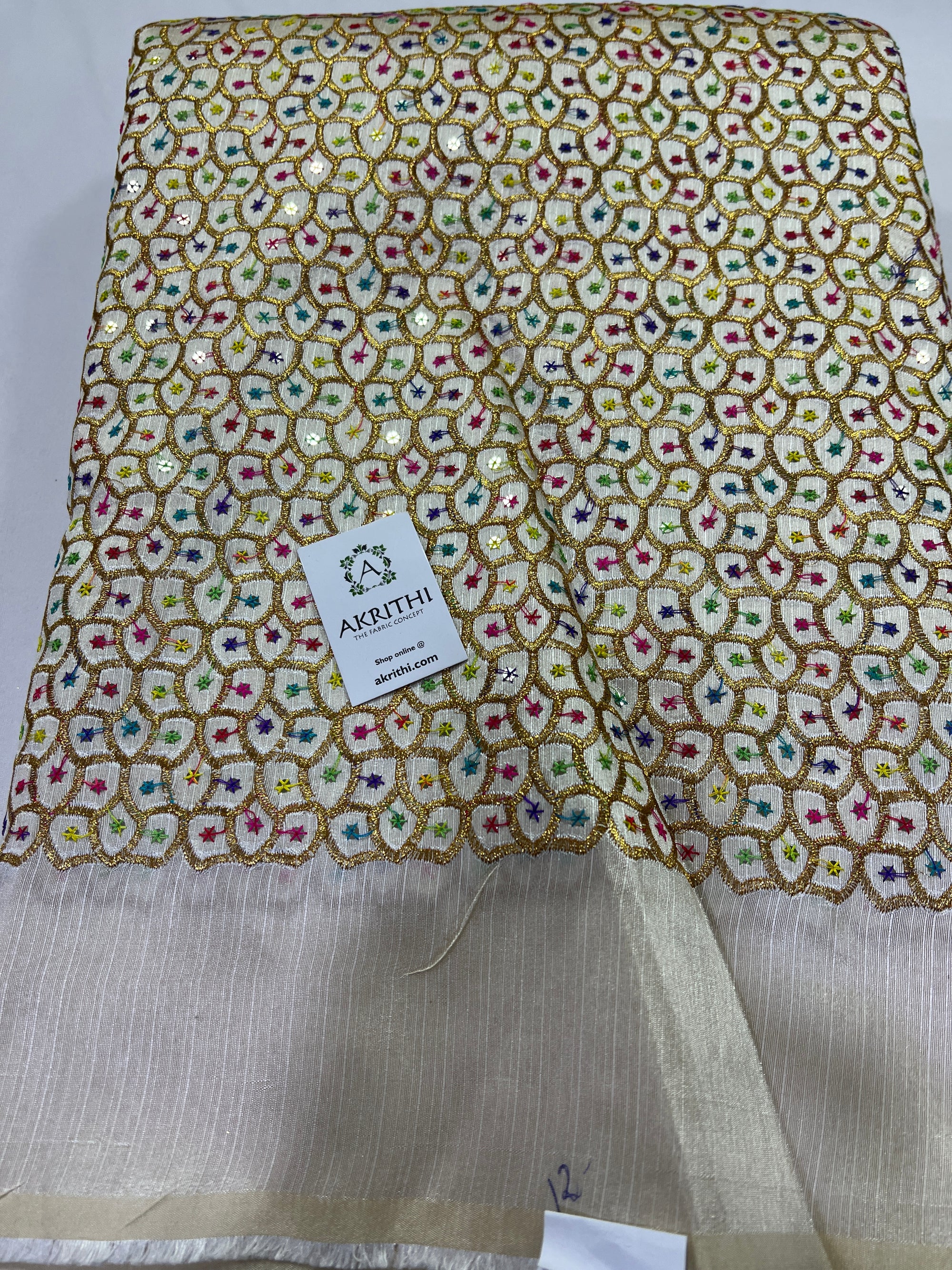 Embroidery on raw silk fabric