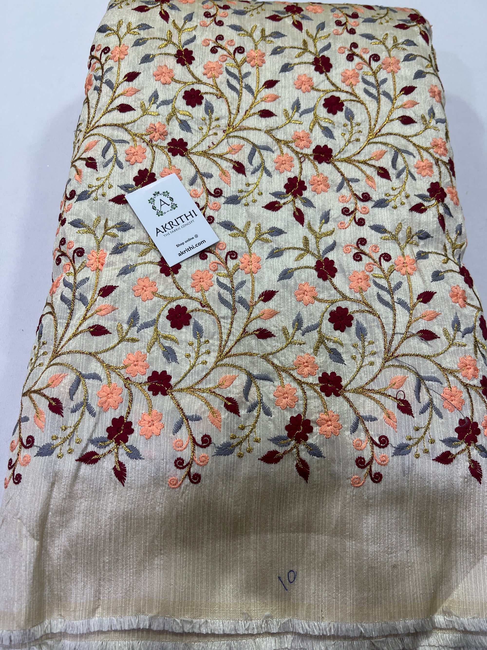 Embroidery on raw silk fabric