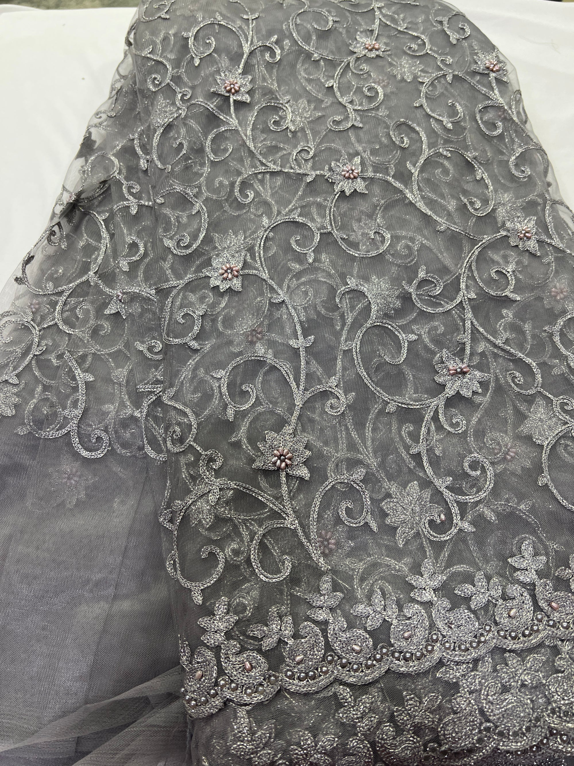 Embroidery on net fabric