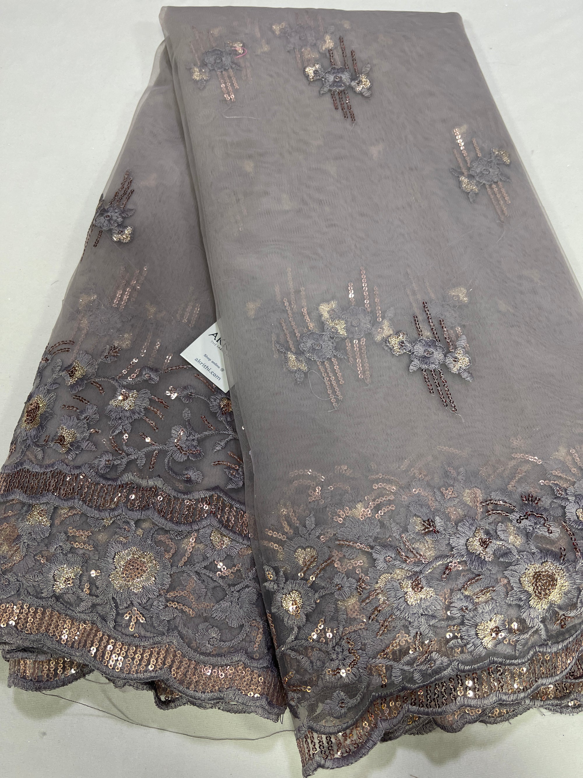 Embroidery on net fabric