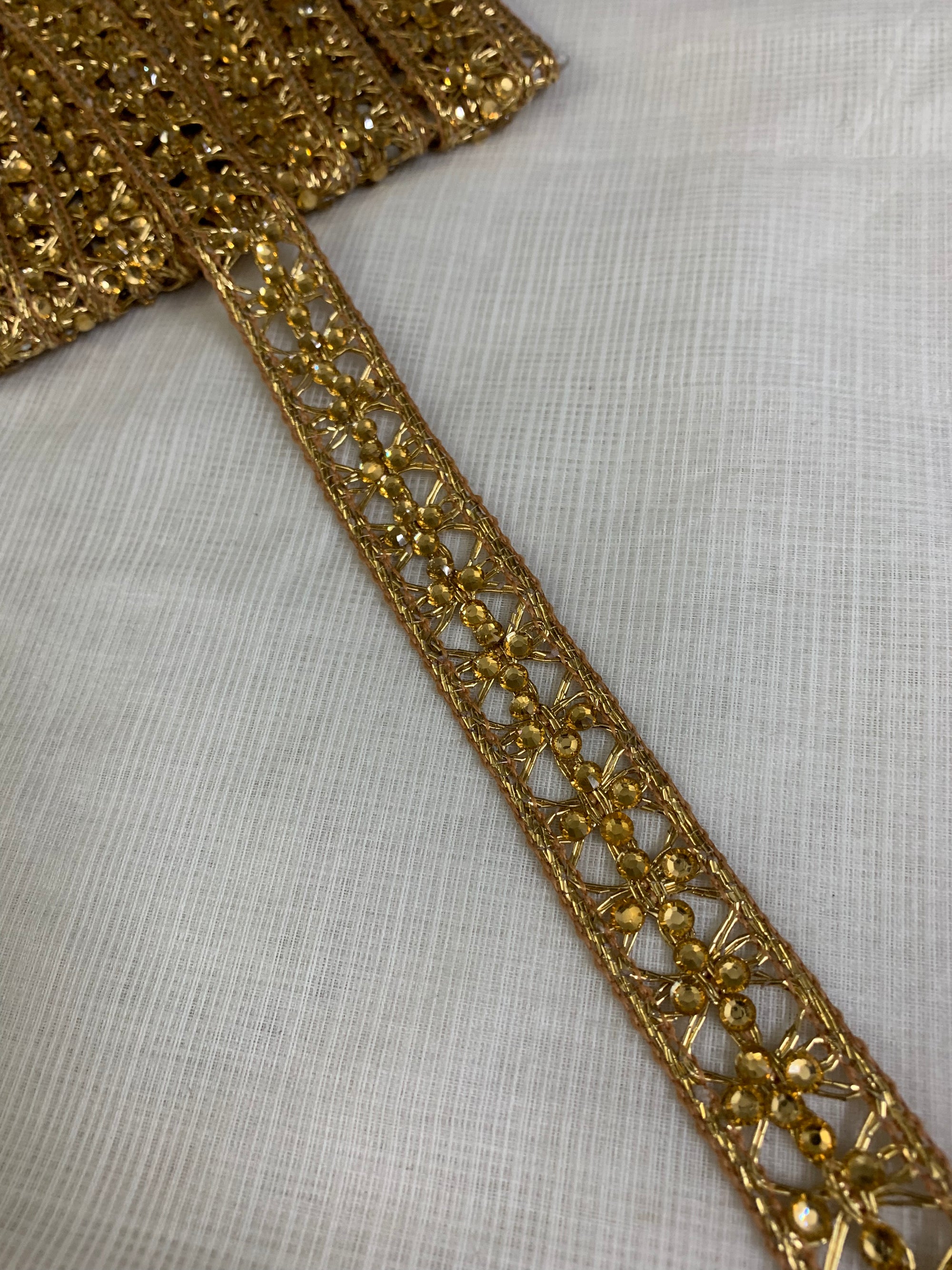 Embroidered lace 9 metres roll gold