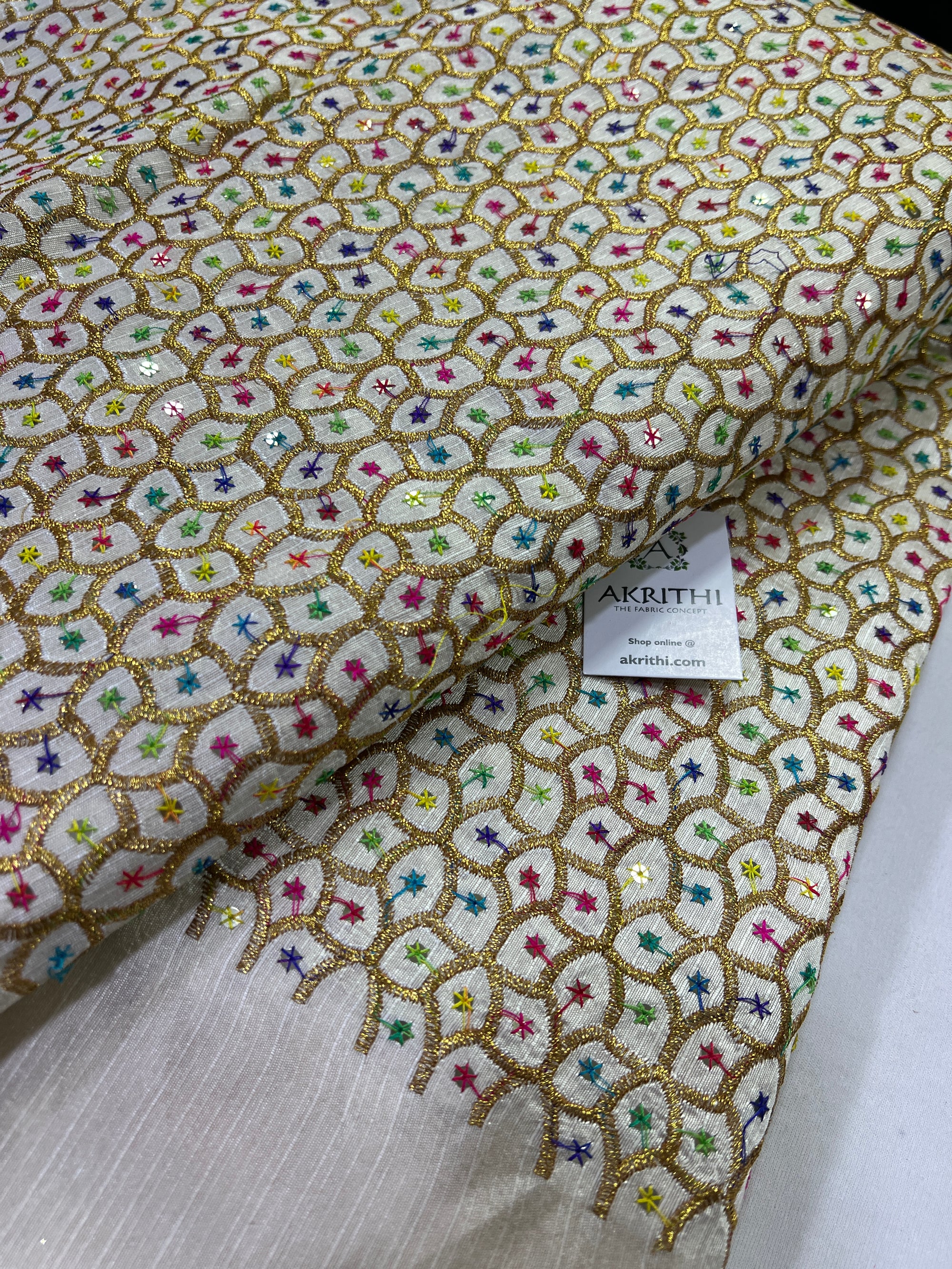 Embroidery on raw silk fabric