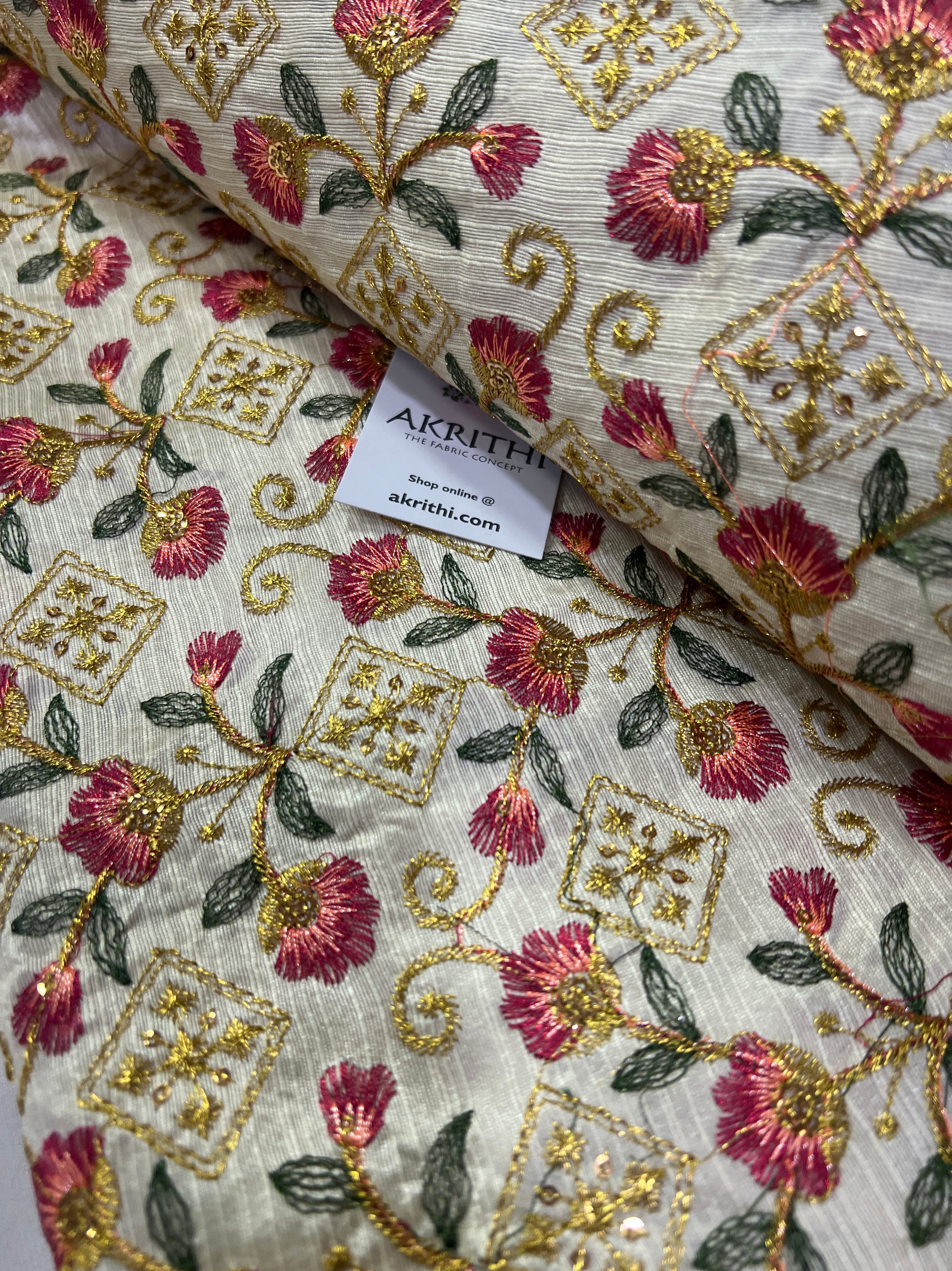 Embroidery on raw silk fabric