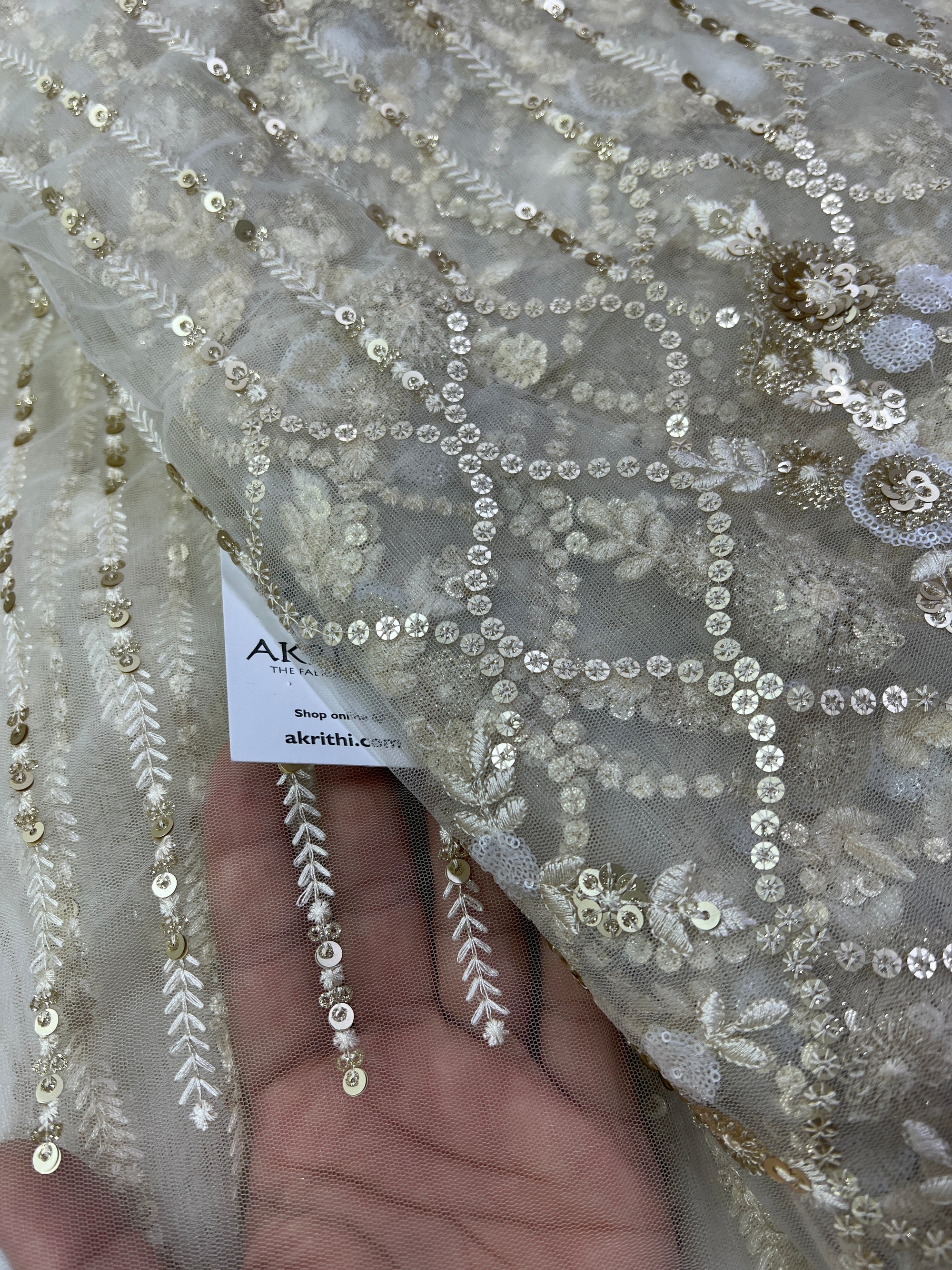 Embroidery on net fabric