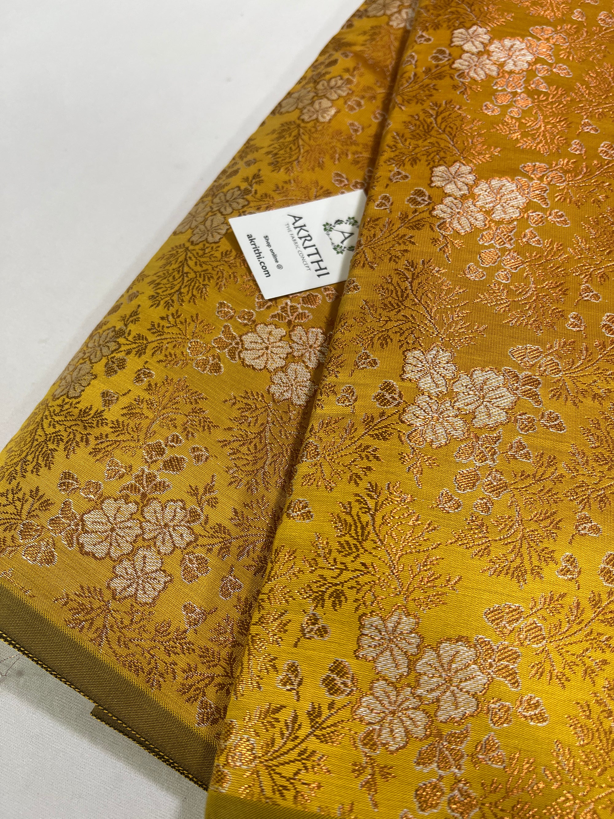 Banarasi brocade fabric with copper zari